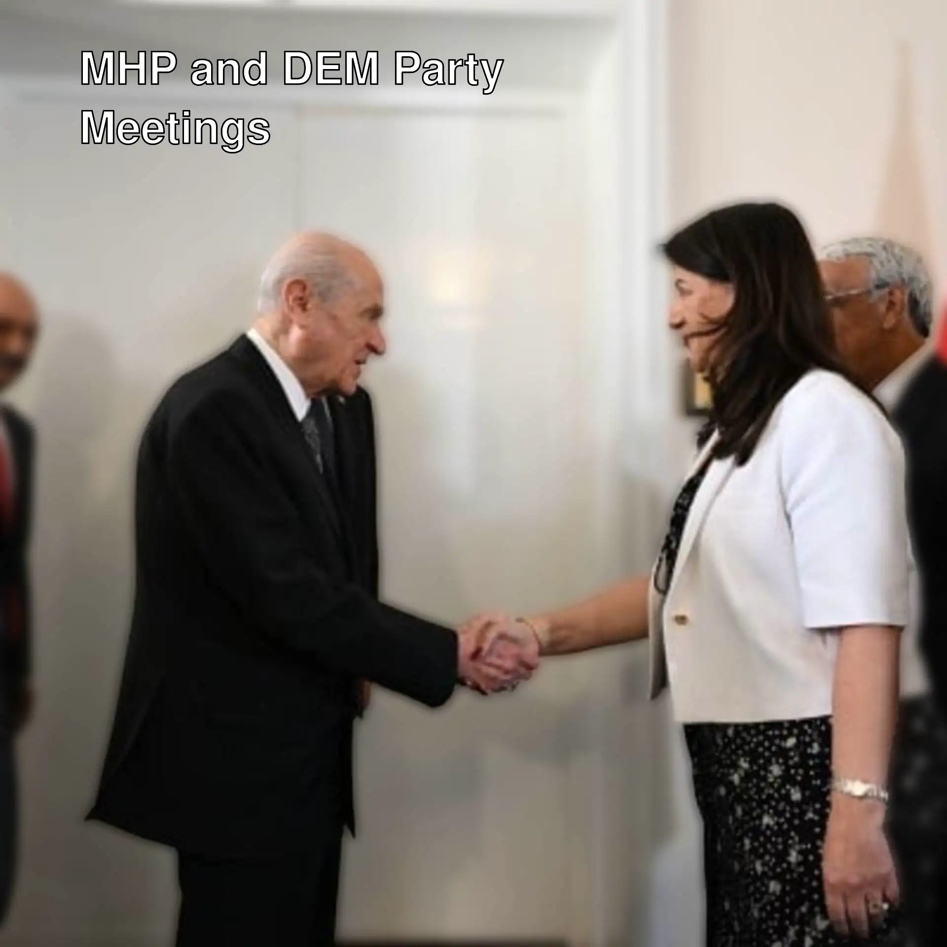 Moment of handshake between MHP and DEM Party delegations. Moment of handshake between MHP and DEM Party delegations.