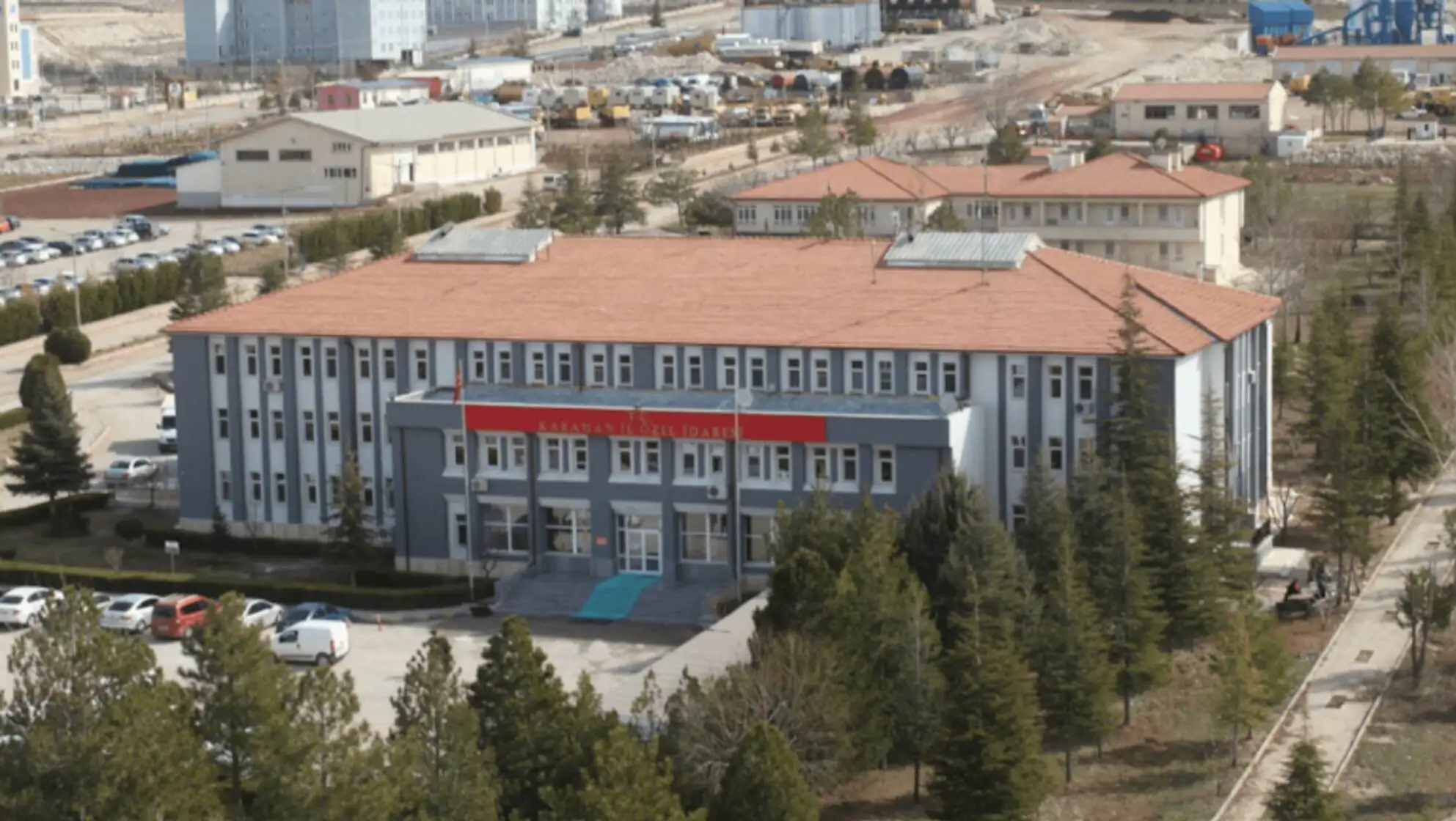 A building surrounded by trees. A building surrounded by trees.