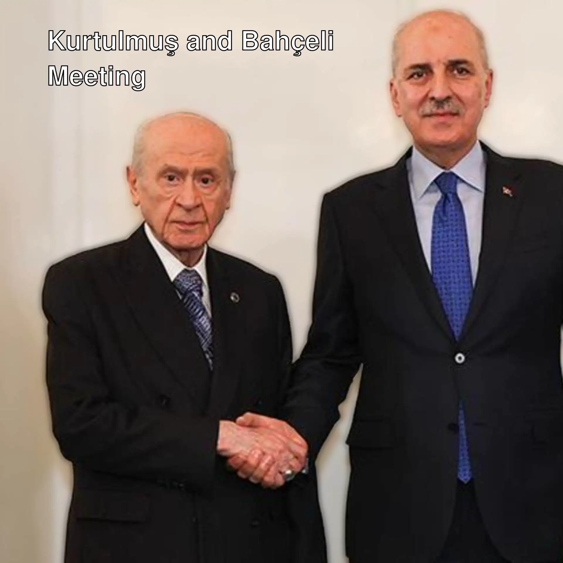 Kurtulmuş and Bahçeli shaking hands.