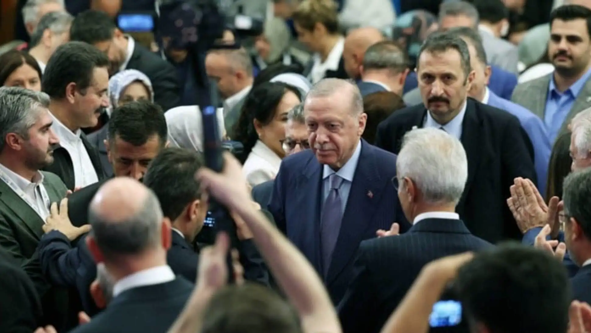 A group of people in suits A group of people in suits