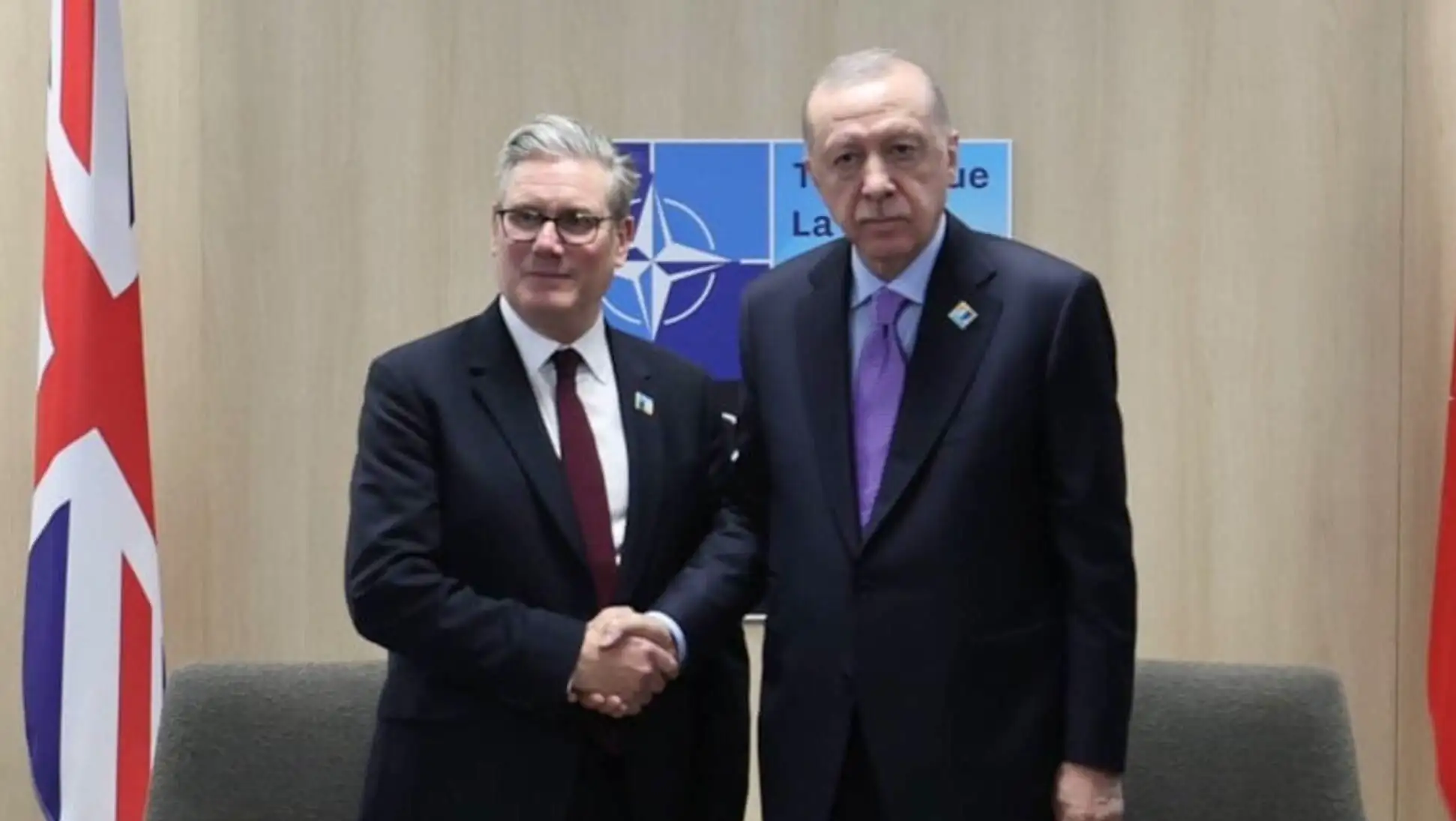 President Erdoğan shaking hands with the UK Prime Minister. President Erdoğan shaking hands with the UK Prime Minister.