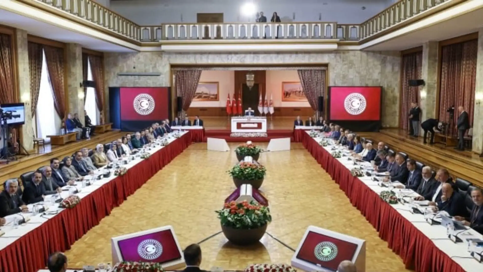 A group of people sitting at a table.