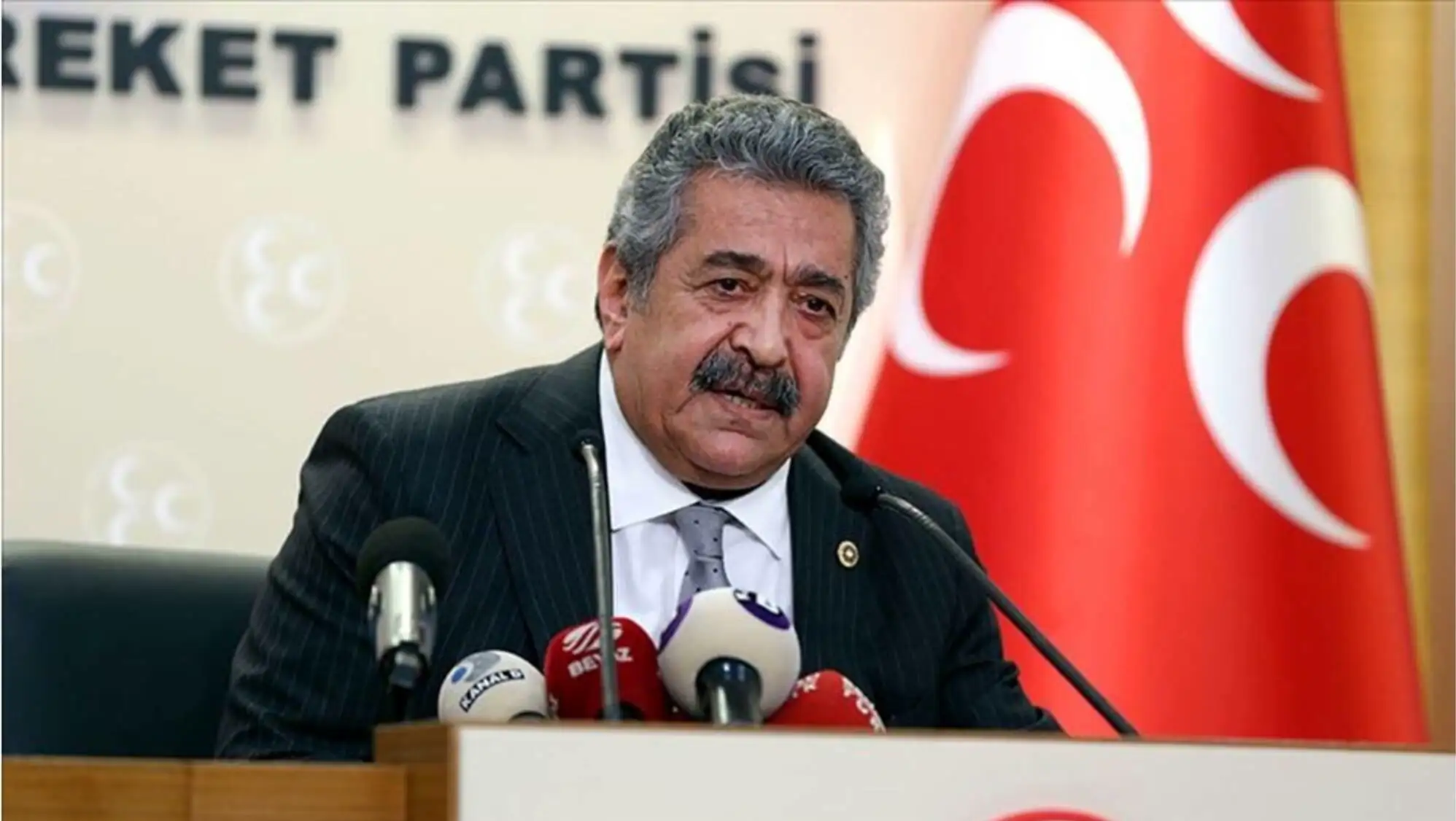 Feti Yıldız providing information about the penal law at a press conference.