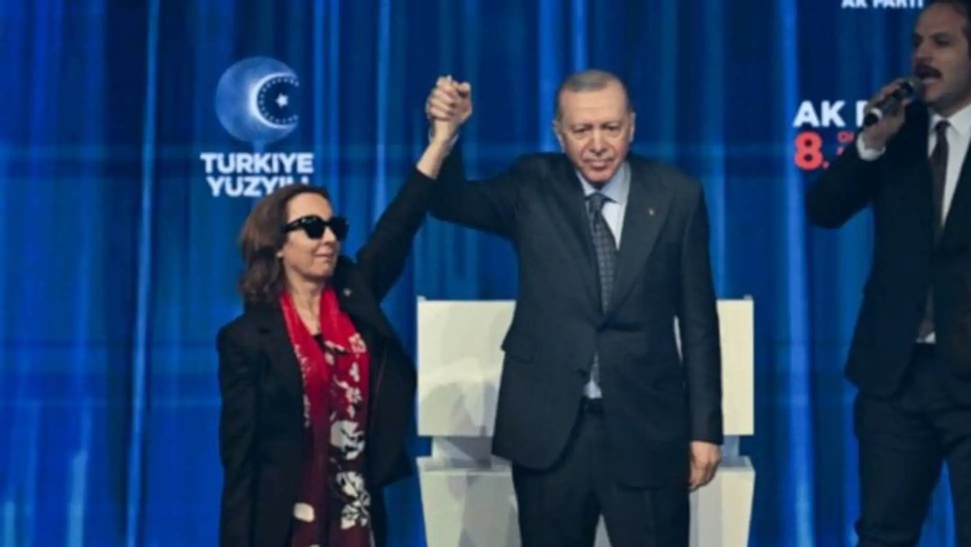 A man and woman holding hands.