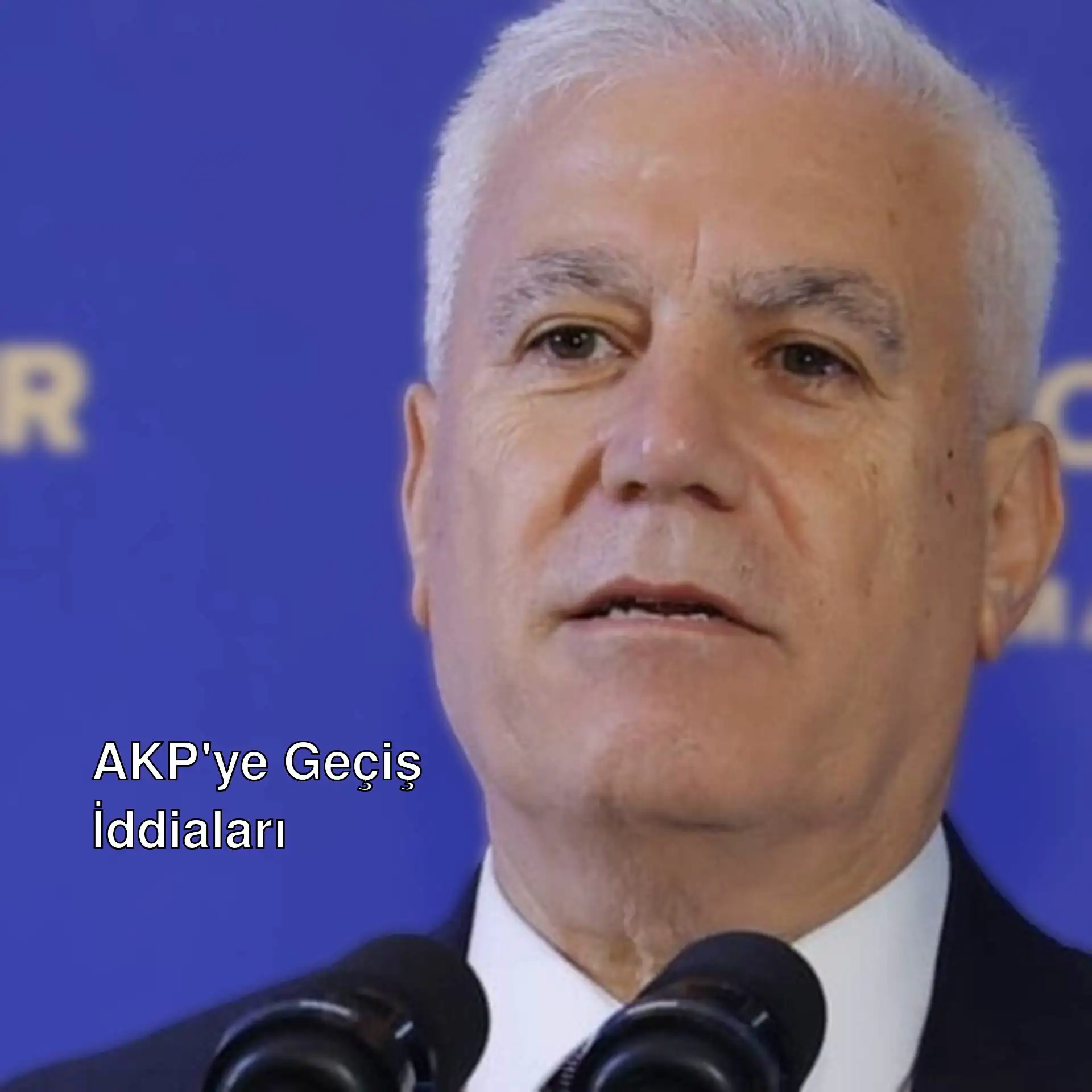 Bir adam takım elbise giymiş. Bir adam takım elbise giymiş.