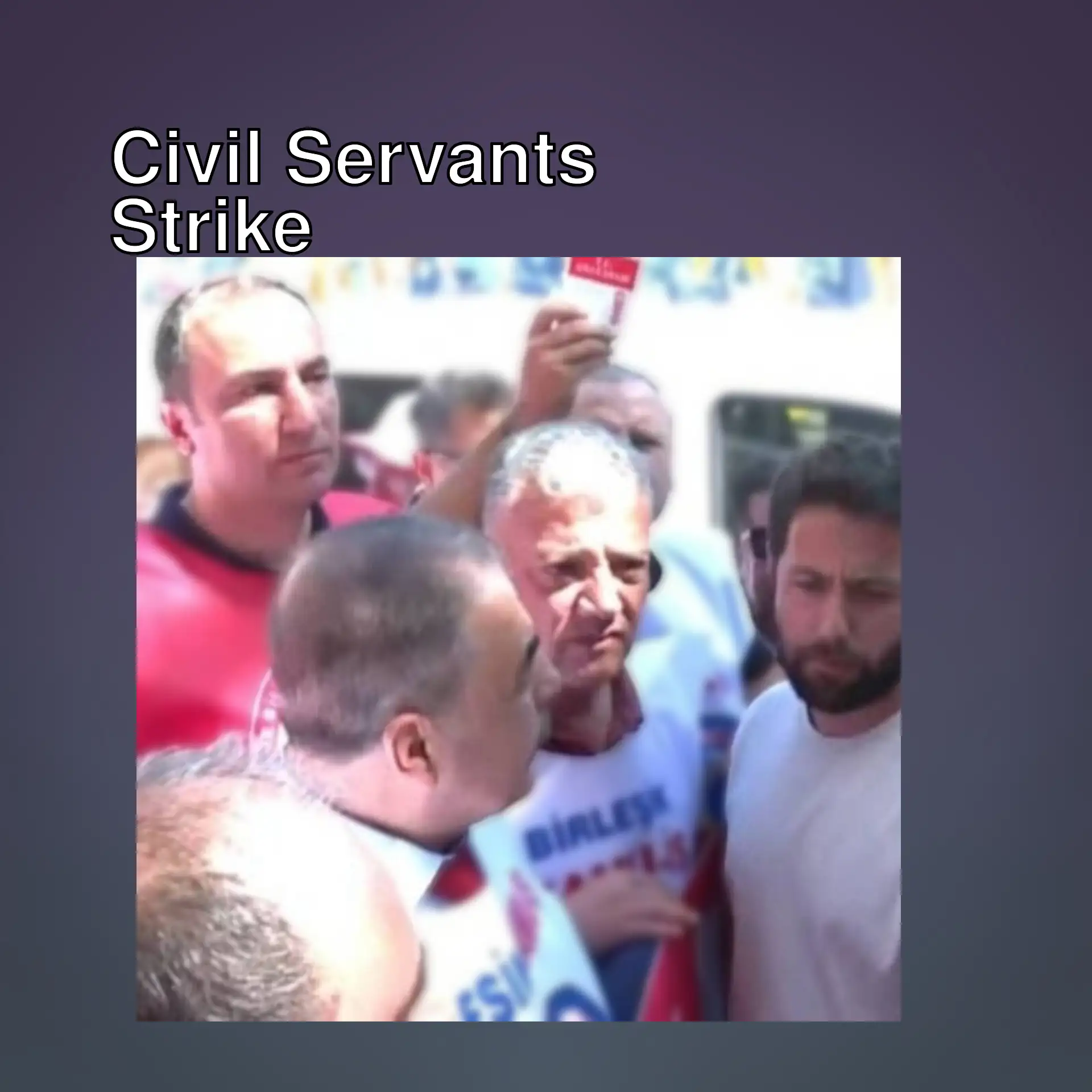A group of men standing in a crowd. A group of men standing in a crowd.