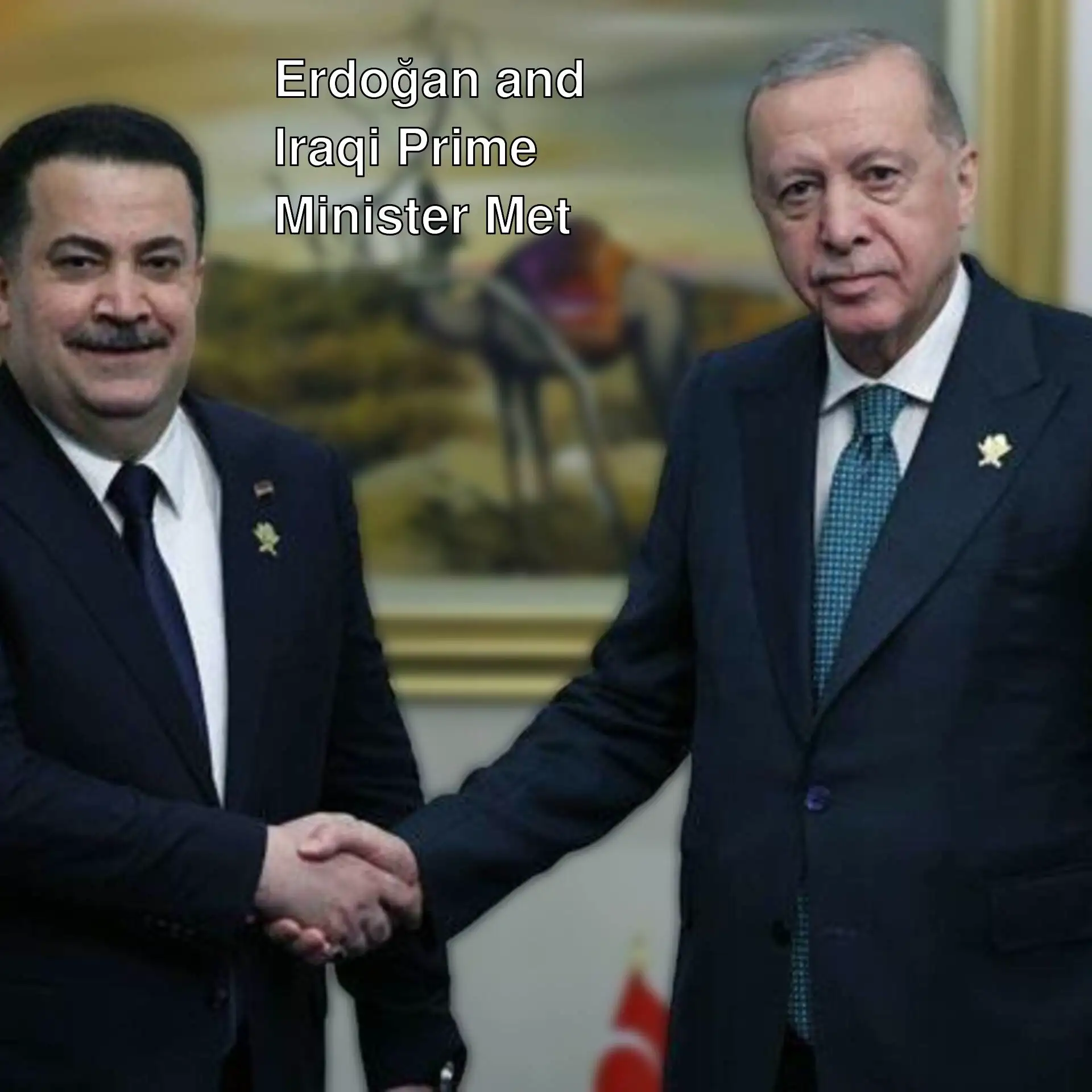 President Erdoğan and Iraqi Prime Minister Sudani shake hands.