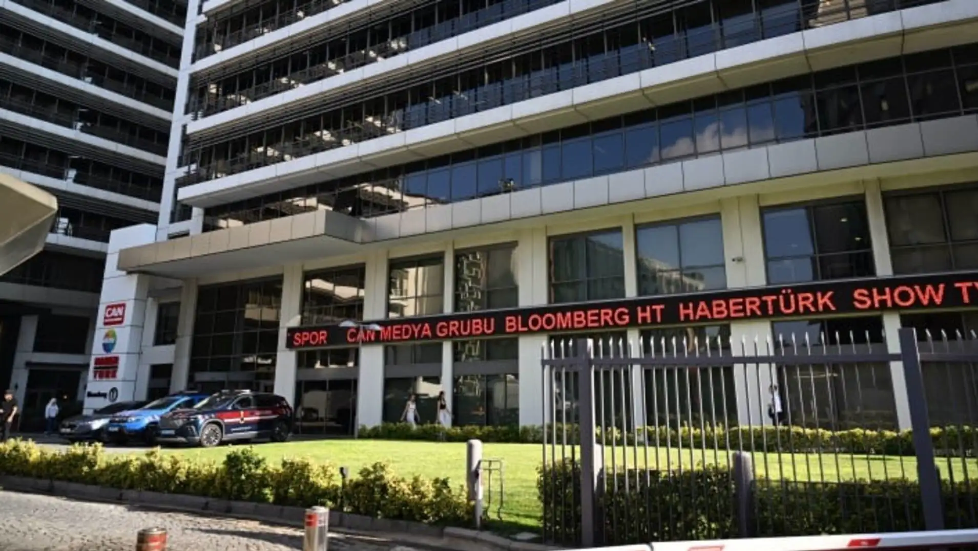 Gendarmerie vehicles in front of Can Holding building Gendarmerie vehicles in front of Can Holding building