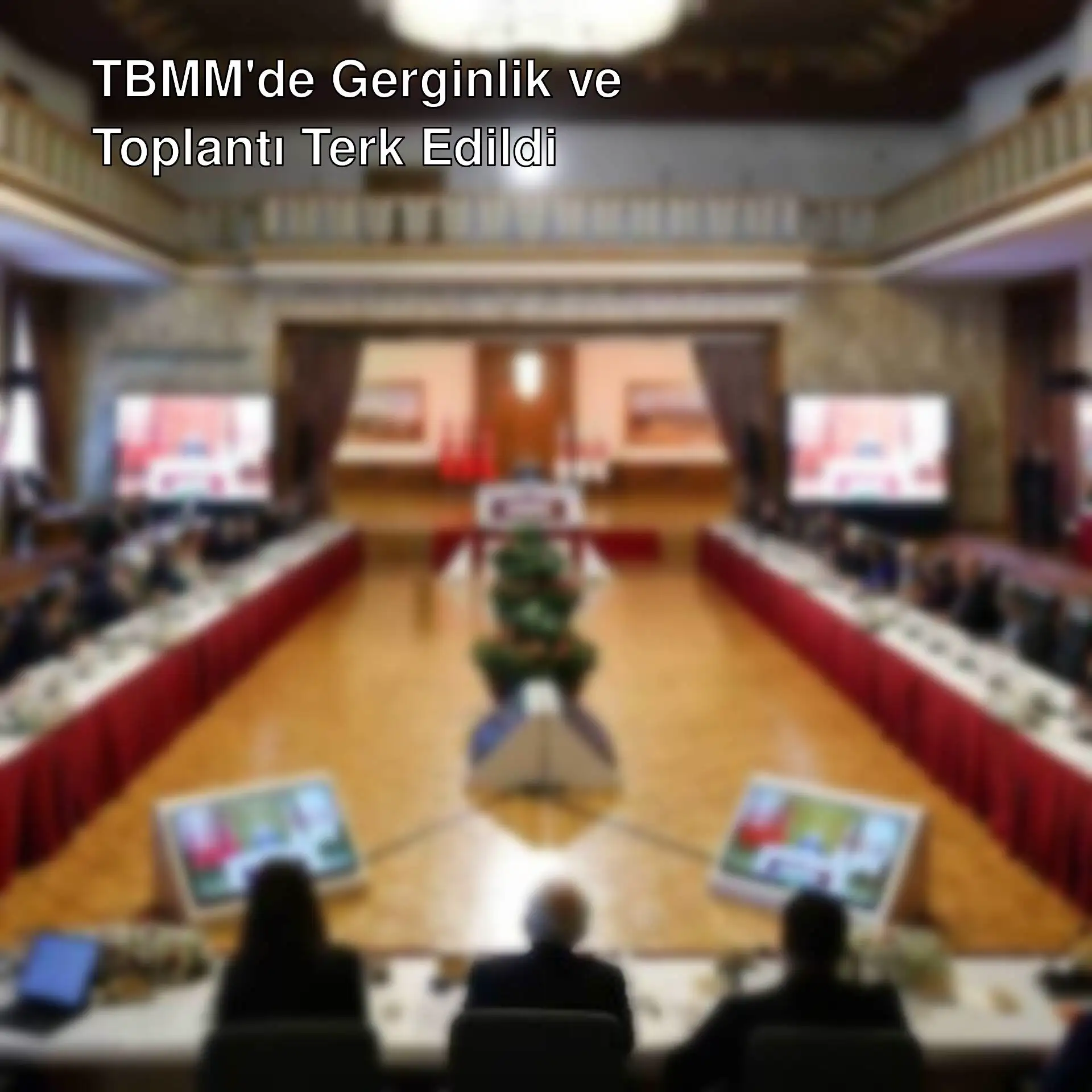 TBMM toplantısında gergin anlar. Bir grup insan masada oturuyor.