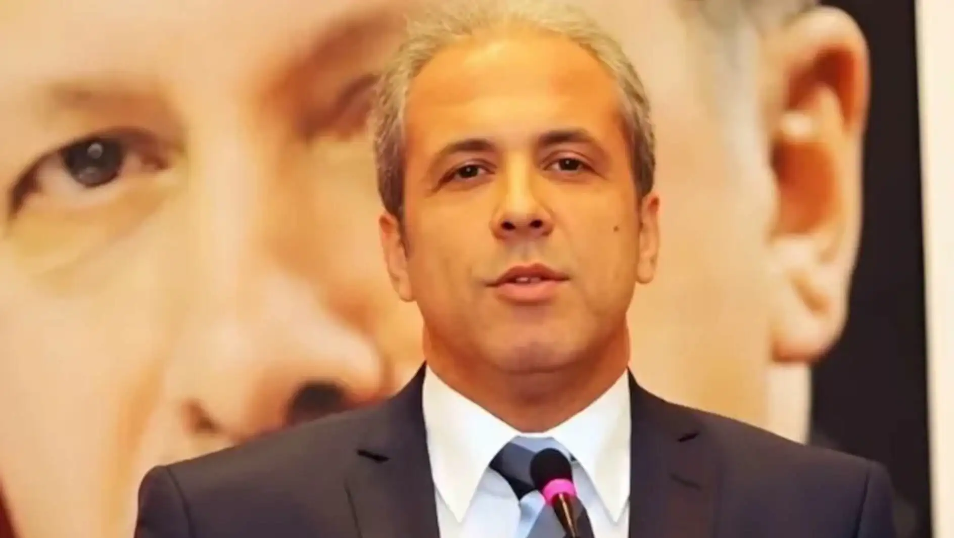 A man in a suit and tie.