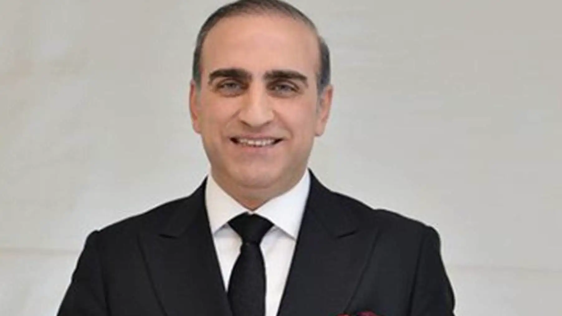 A man in a suit and tie.