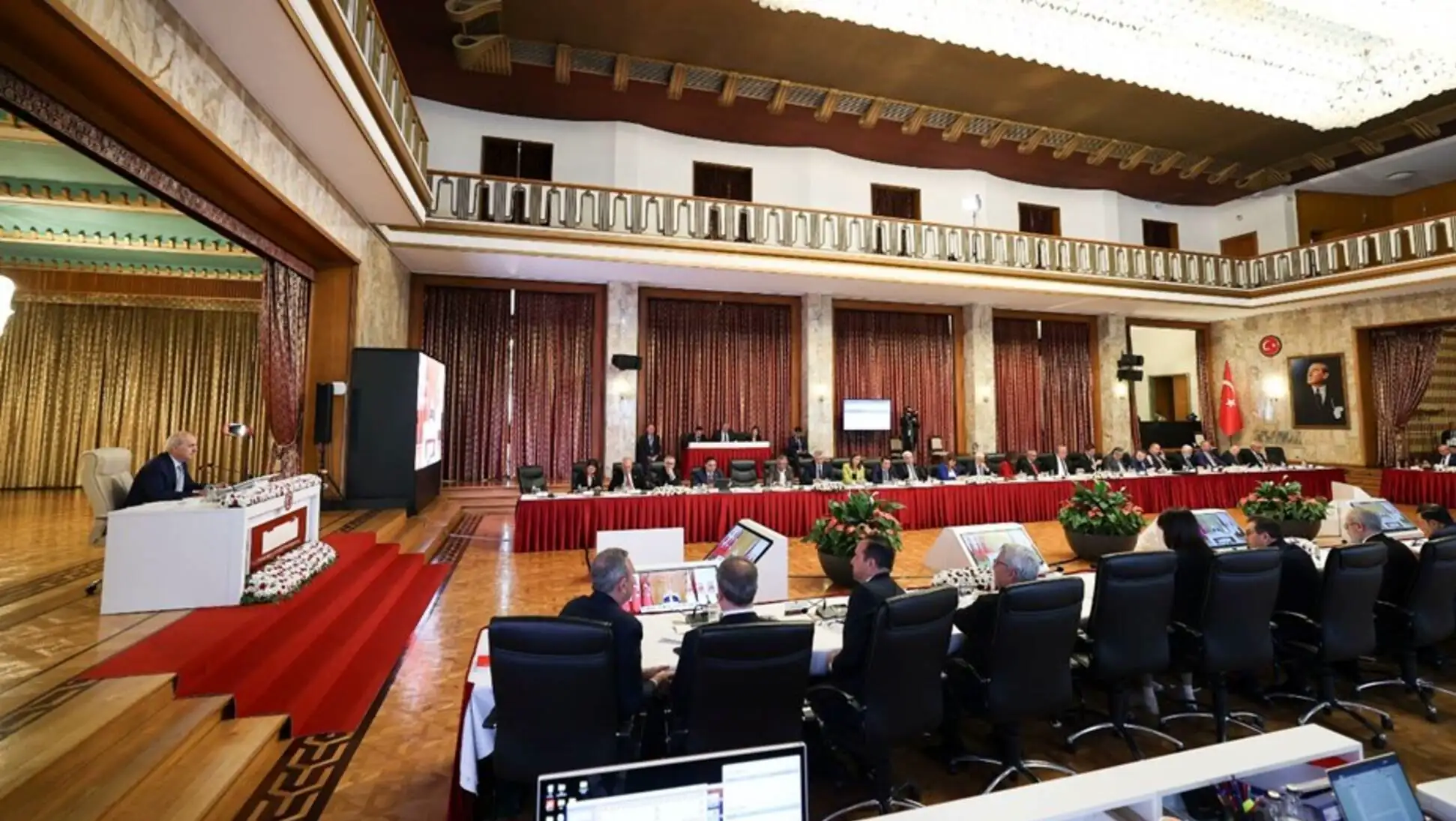A group of people at a TBMM meeting.