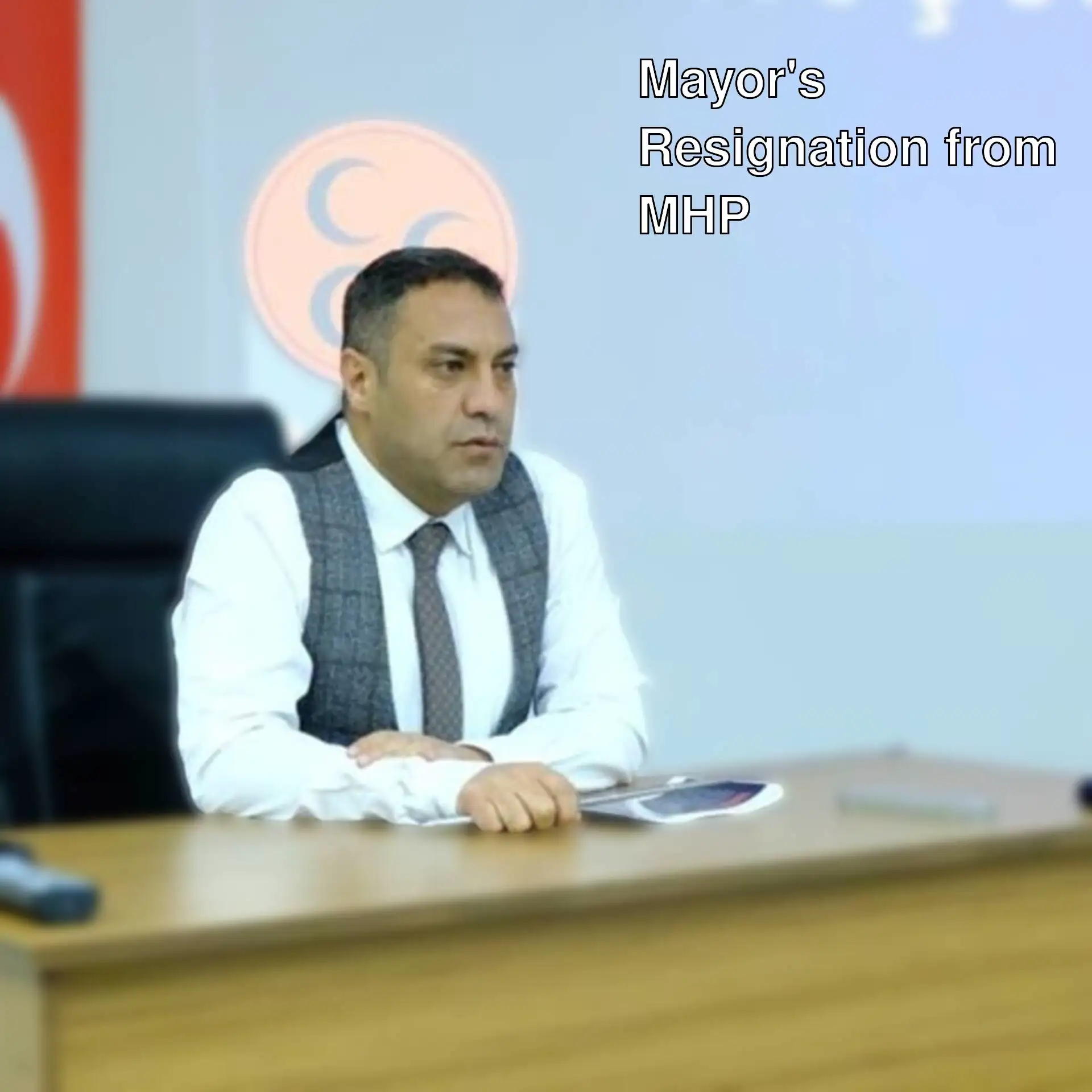 MHP Deputy Chairman Sadir Durmaz making a statement.