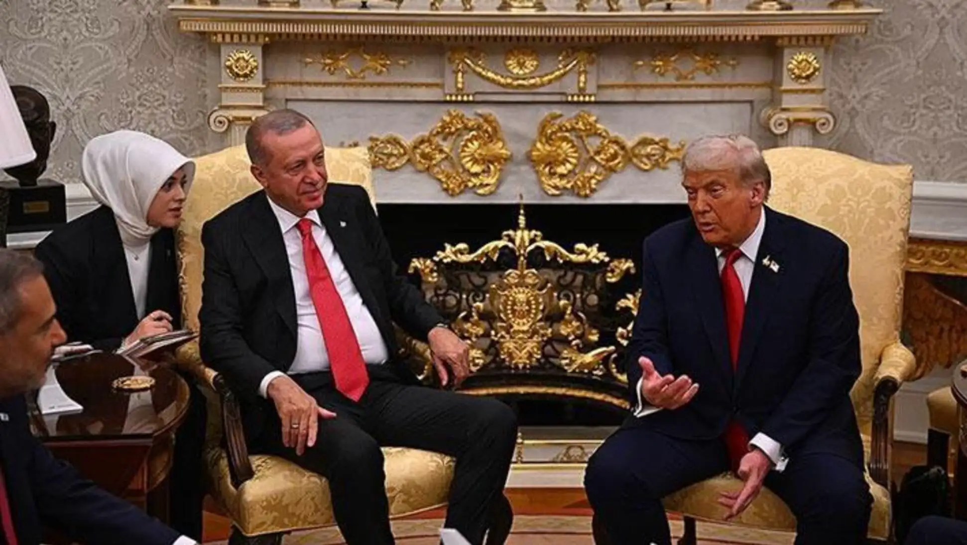 President Erdoğan and Trump are talking during the meeting.