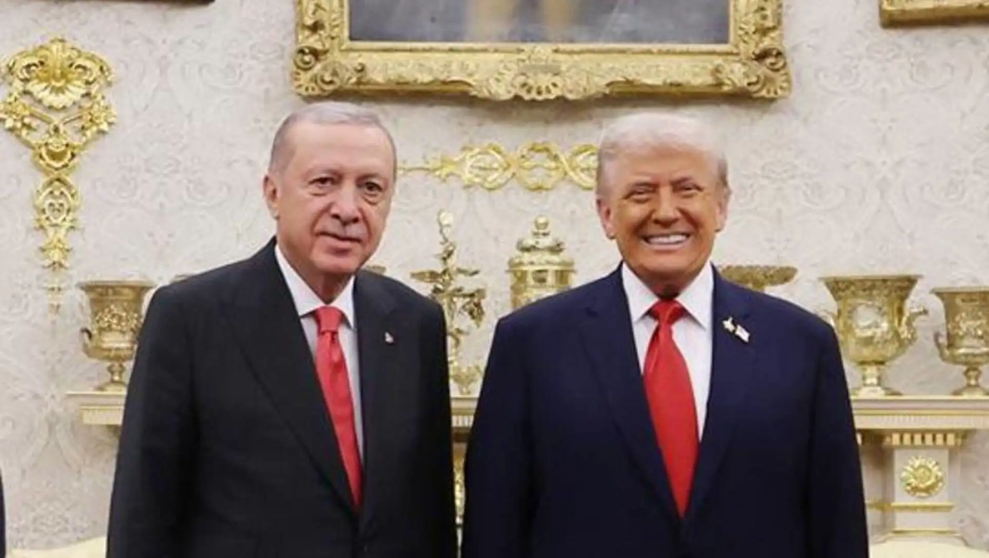 President Erdoğan and Trump shake hands after the meeting.