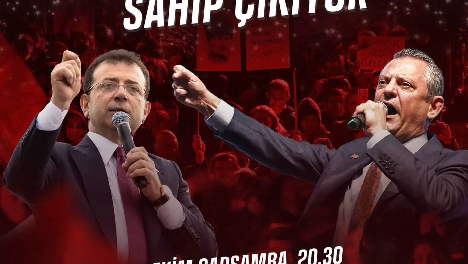 Two men holding microphones.
