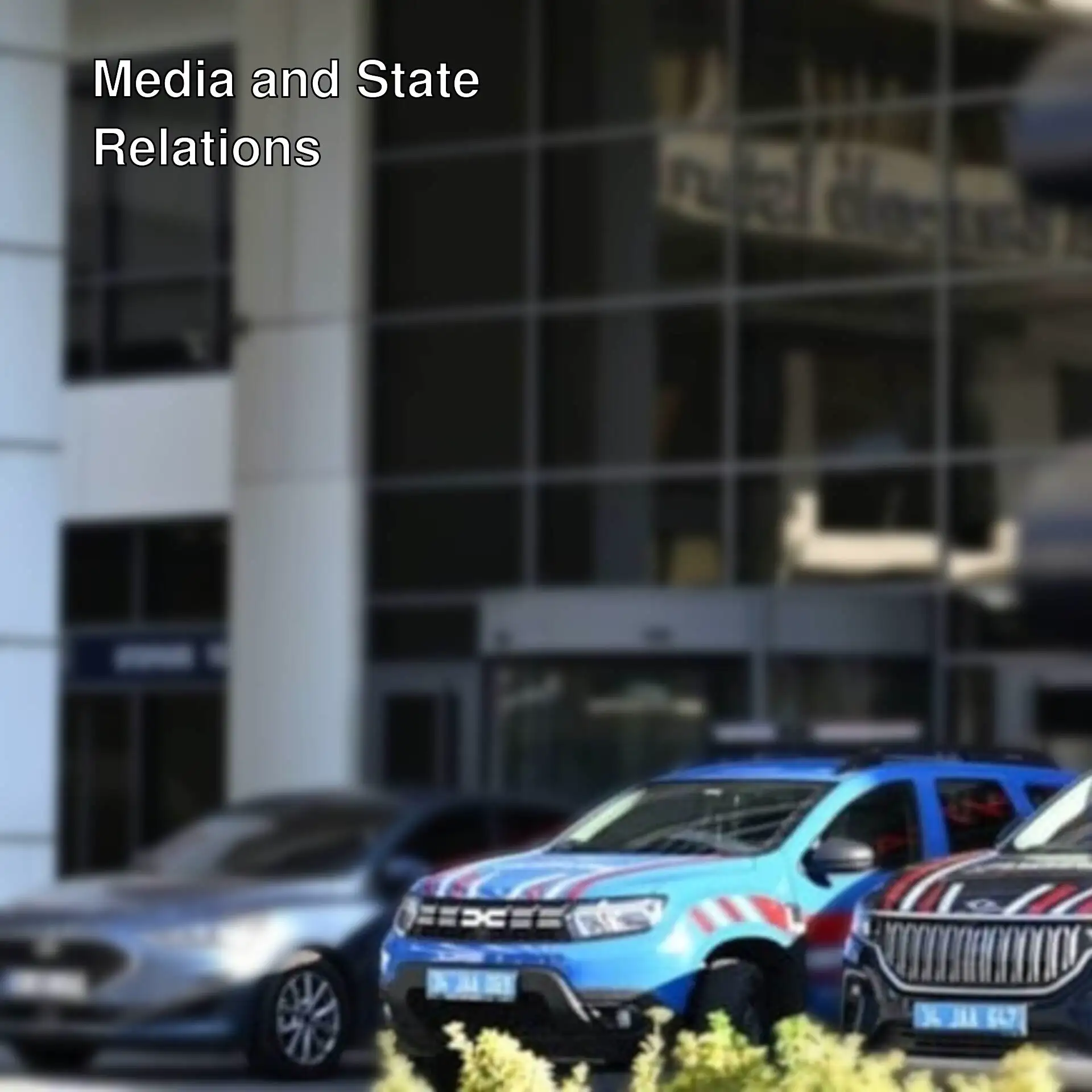 Police cars parked outside a building. Police cars parked outside a building.
