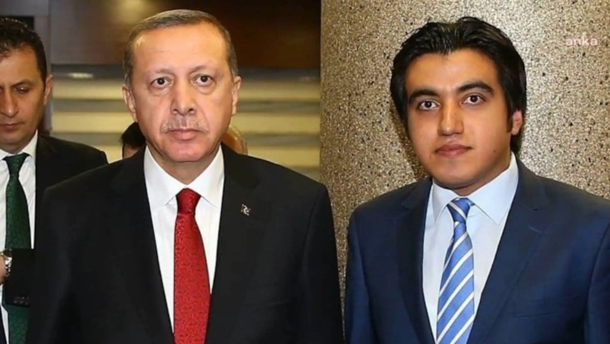 Two men in suits. Two men in suits.