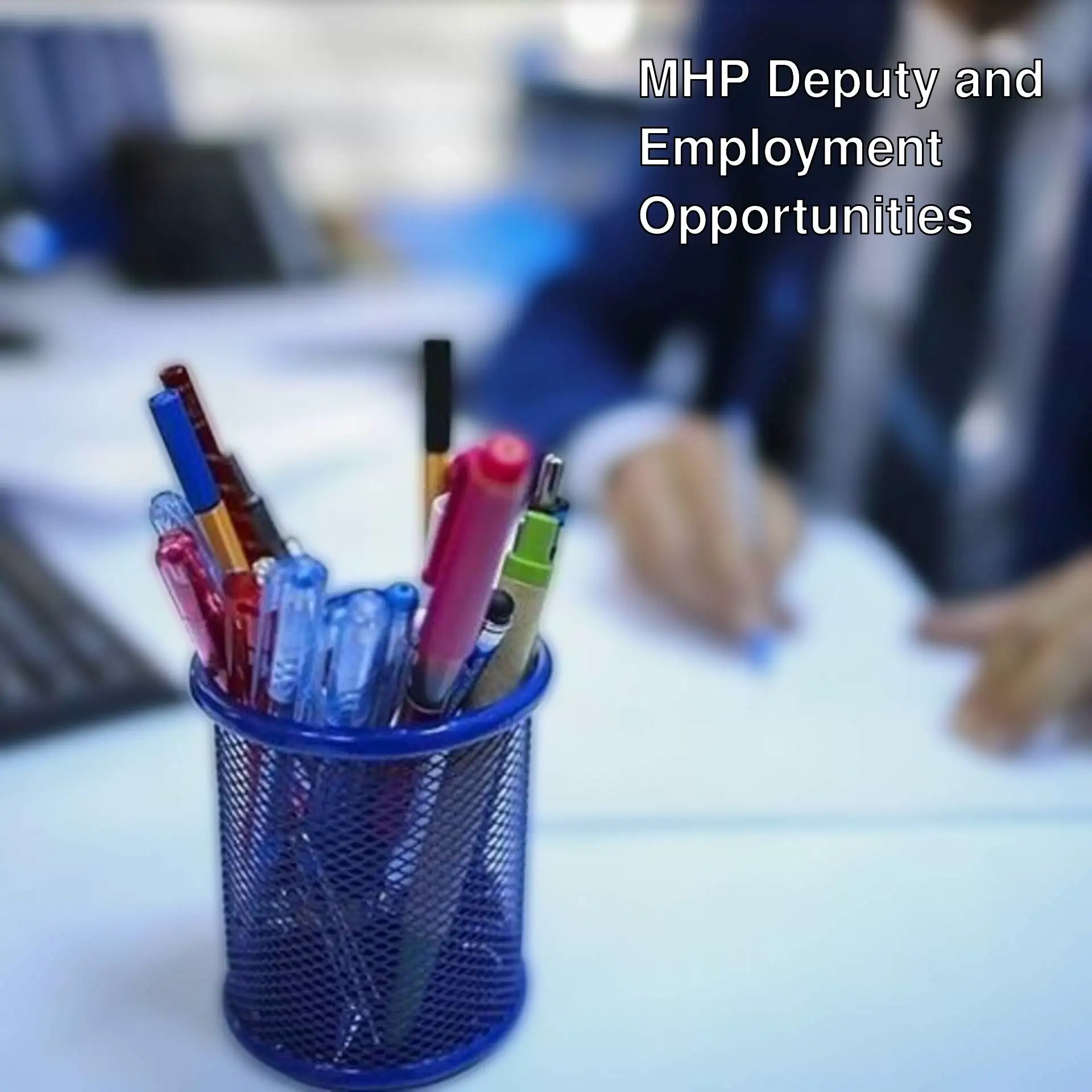 A pen holder with pens in it.