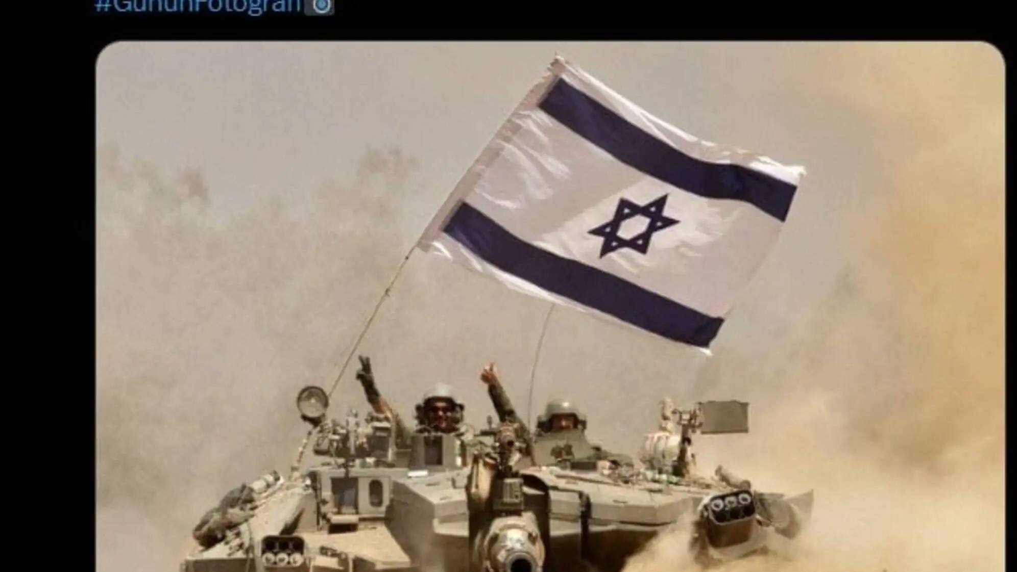 A tank with a flag on it.