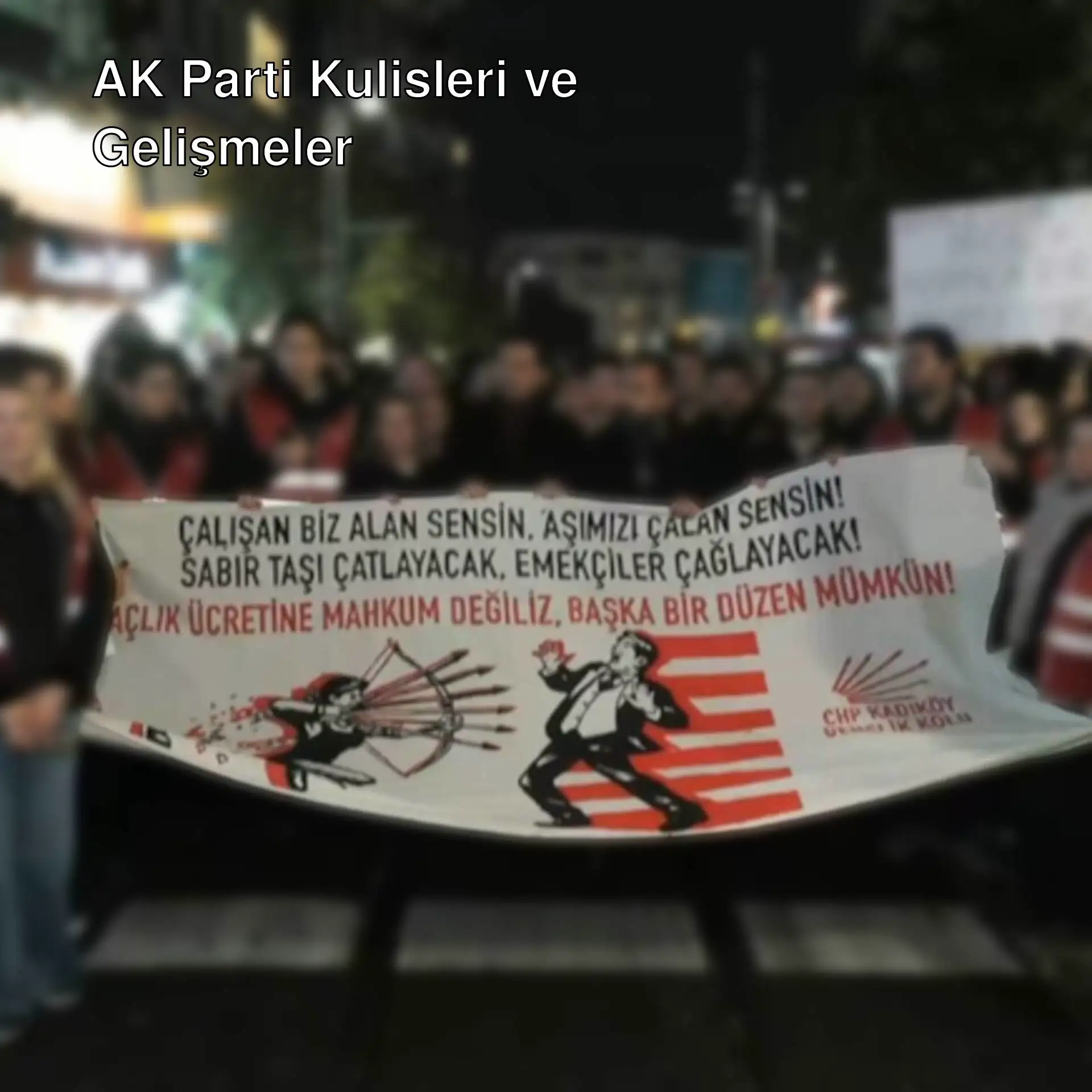 Bir grup insan pankart tutuyor. Bir grup insan pankart tutuyor.