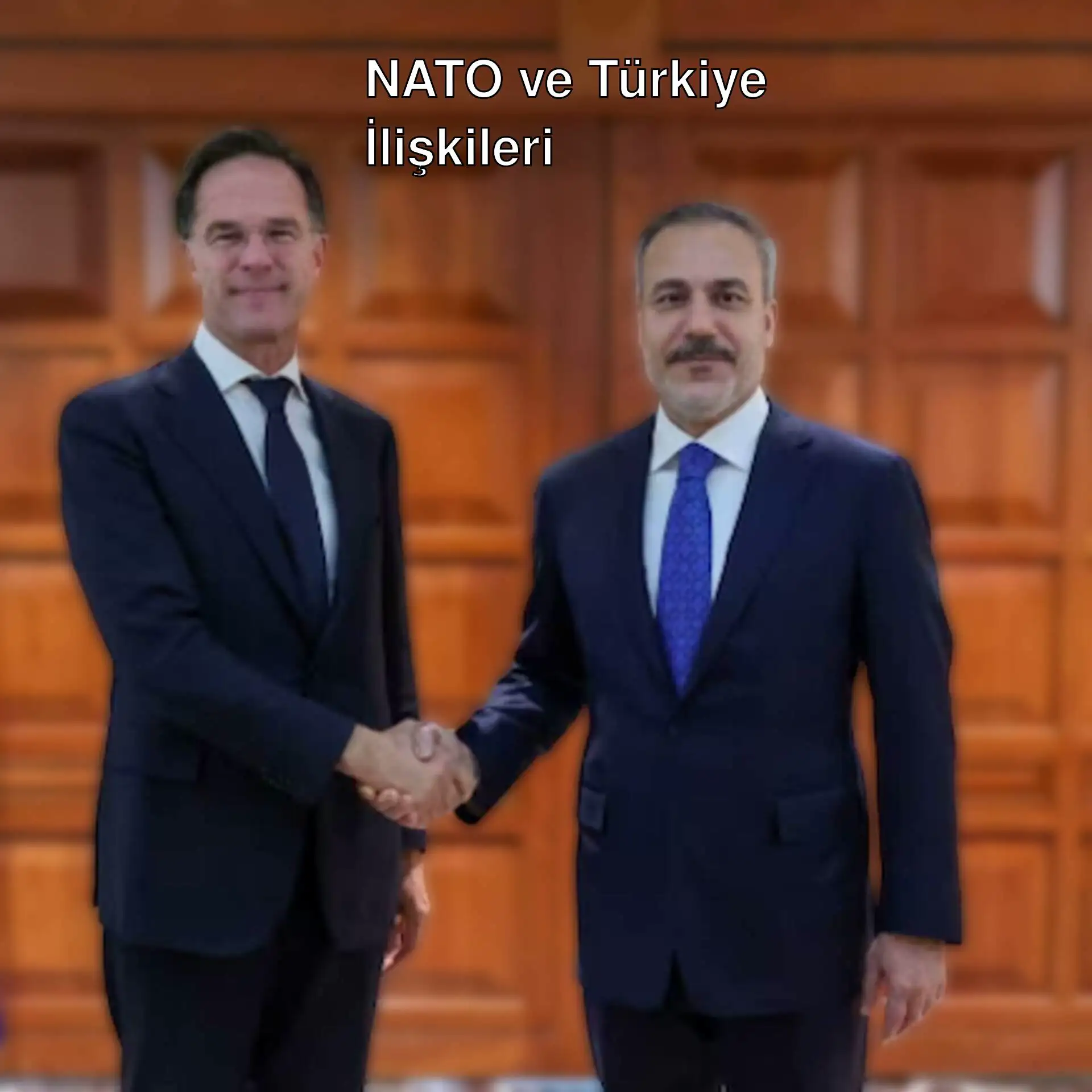 İki adam el sıkışıyor.