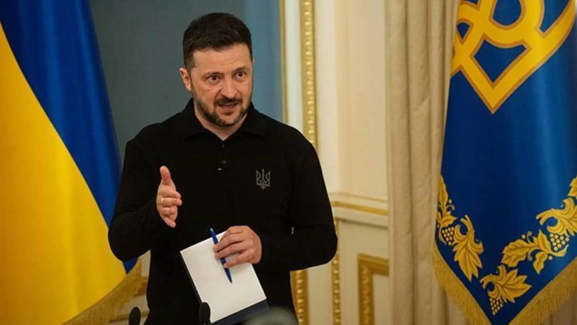 Zelensky making a statement at a press conference. Zelensky making a statement at a press conference.