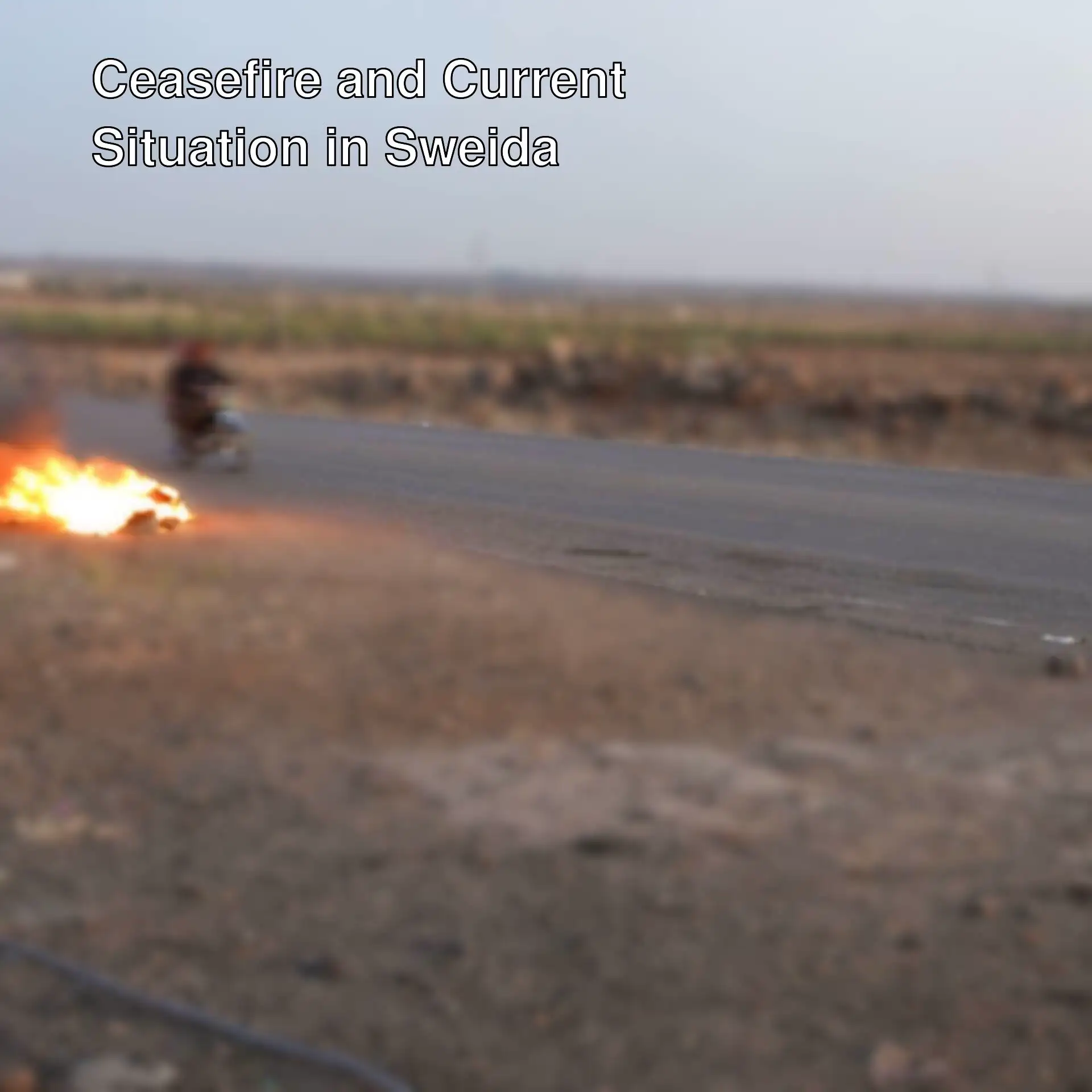 Ceasefire declared in Sweida. A person on fire on a motorcycle. Ceasefire declared in Sweida. A person on fire on a motorcycle.