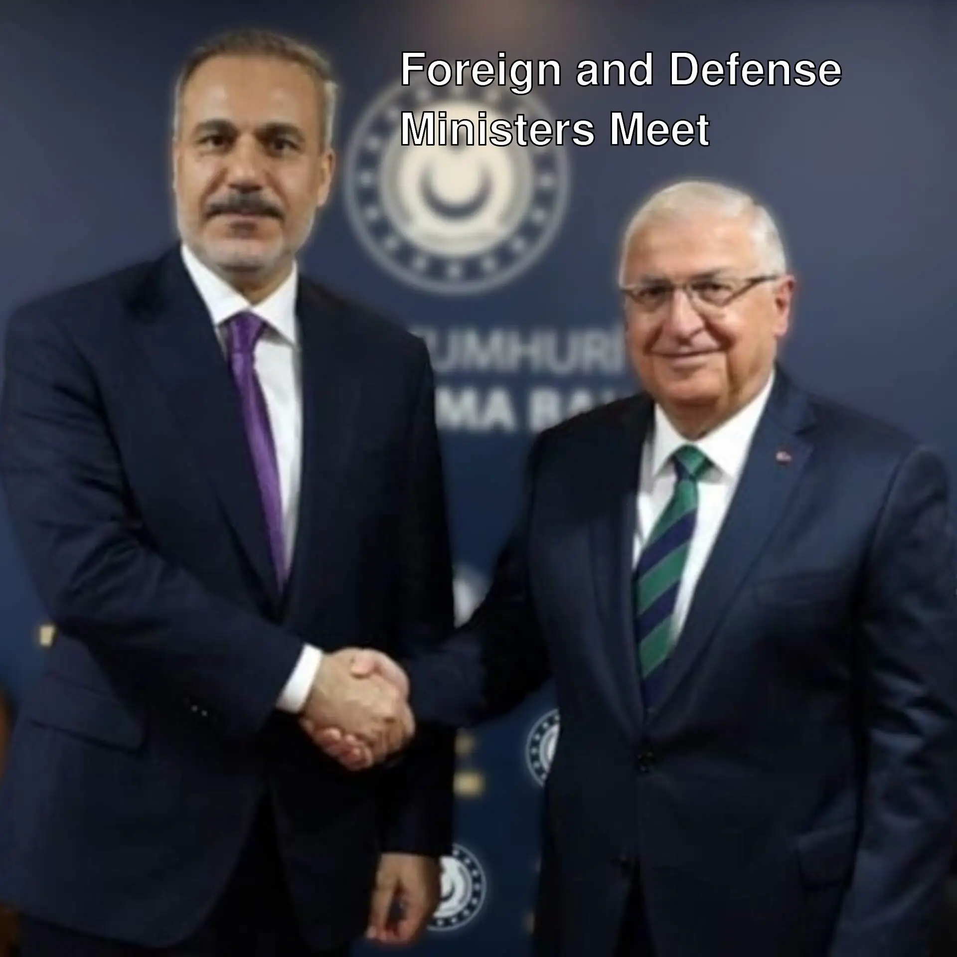 Foreign Minister Hakan Fidan and Defense Minister Yaşar Güler shaking hands.