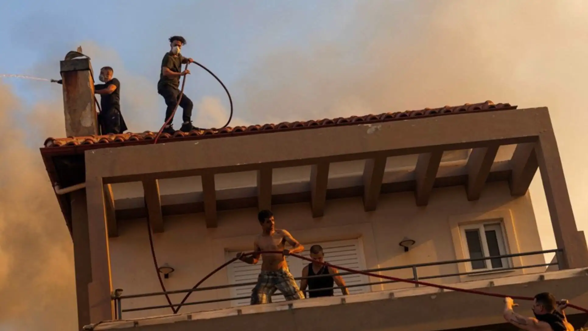Volunteers fighting the fire.