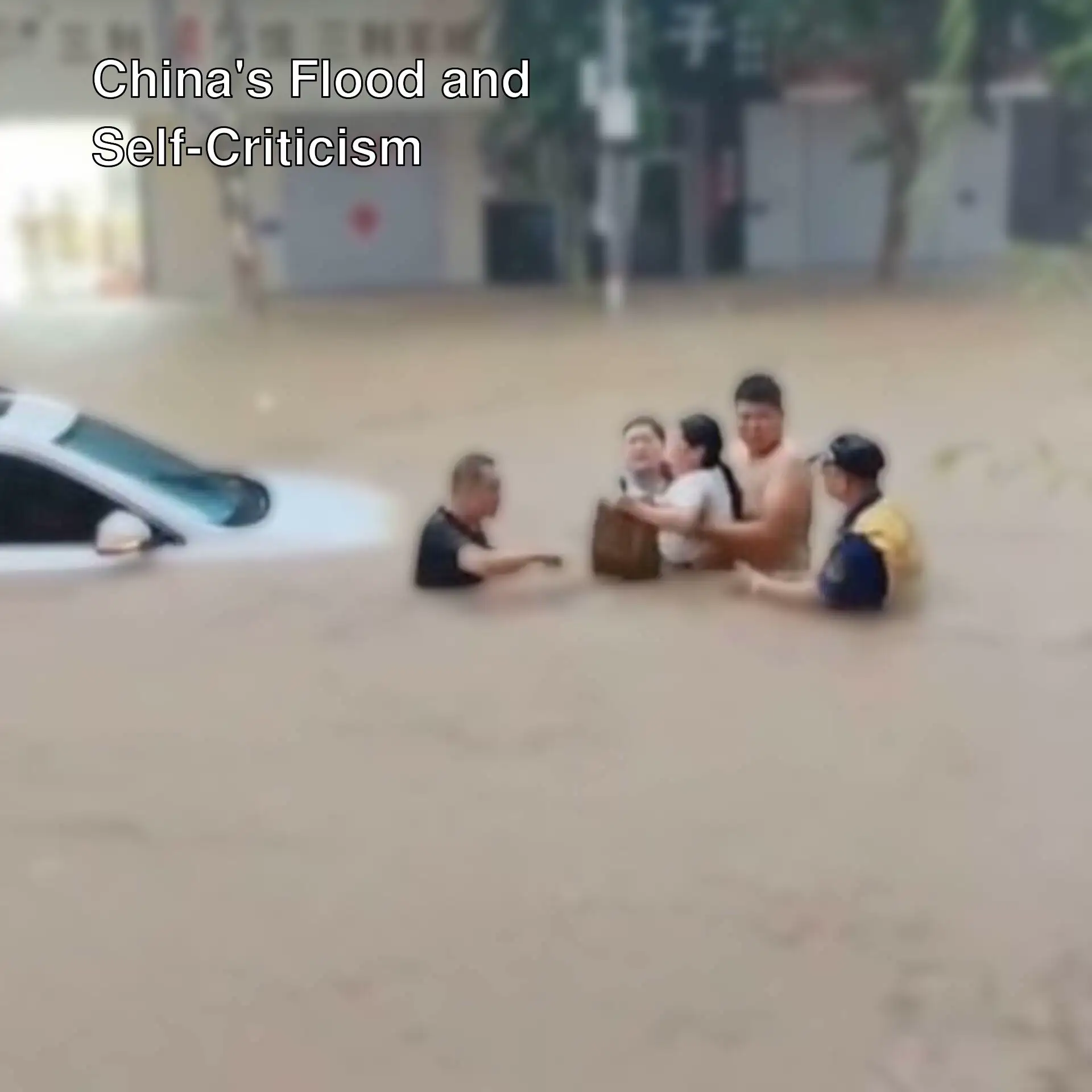 A group of people in a flooded street. A group of people in a flooded street.