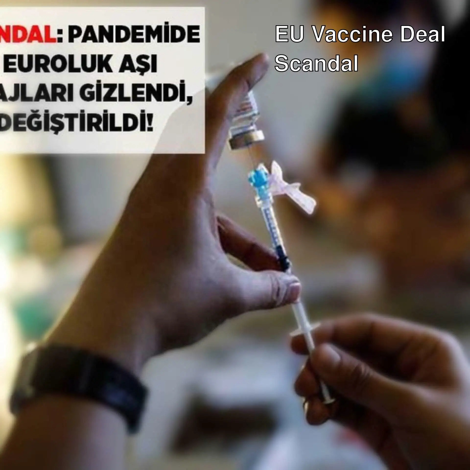 A person holding a syringe. A person holding a syringe.