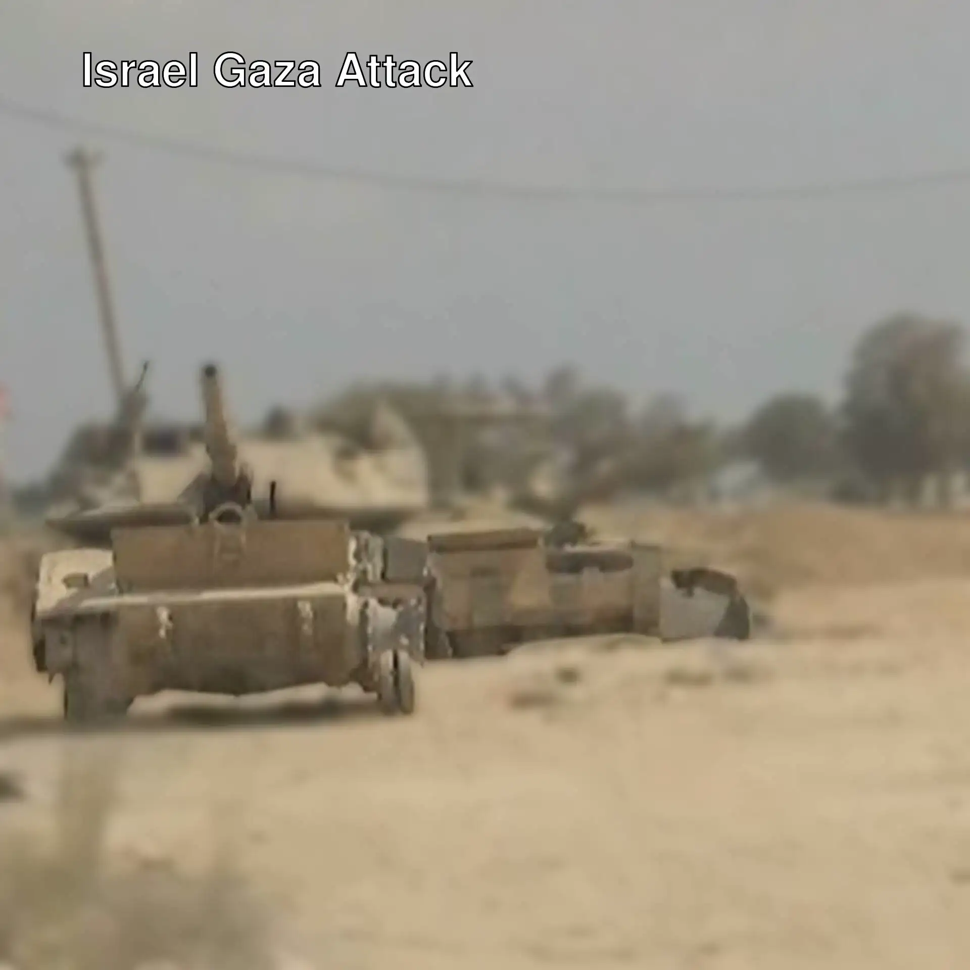 Israeli tanks deployed at the Gaza border. Israeli tanks deployed at the Gaza border.