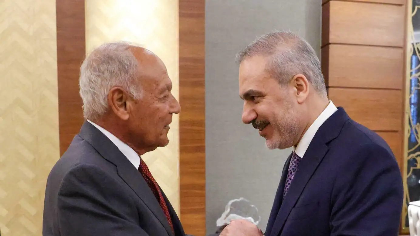 Foreign Minister Hakan Fidan and the Arab League Secretary General shaking hands. Foreign Minister Hakan Fidan and the Arab League Secretary General shaking hands.