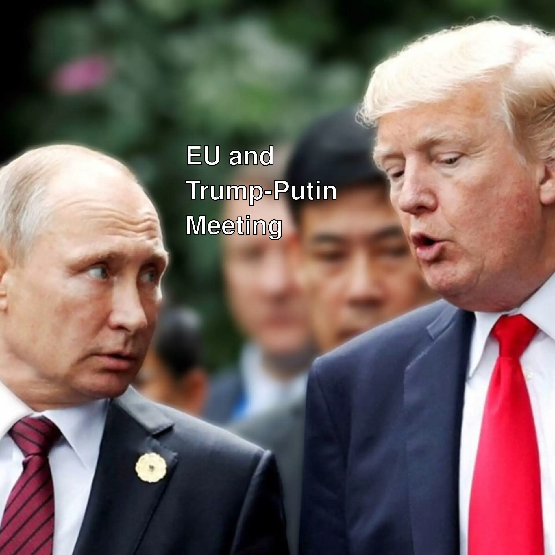 Two men in suits shaking hands.