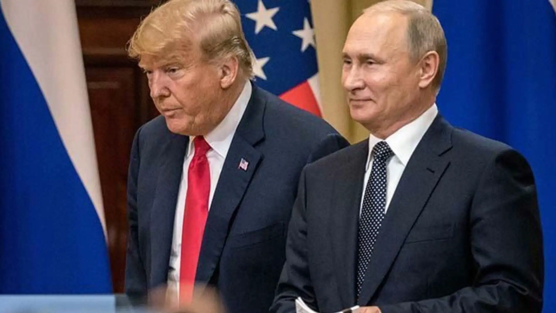 Two men discussing the meeting between Trump and Putin. Two men discussing the meeting between Trump and Putin.