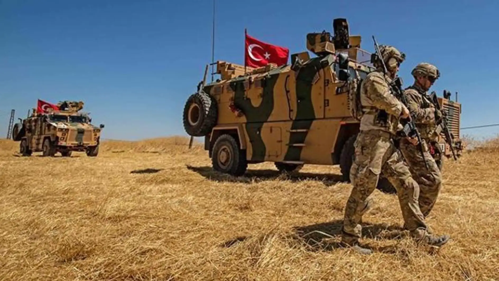 Military vehicles and soldiers showing Turkish presence in Syria. Military vehicles and soldiers showing Turkish presence in Syria.