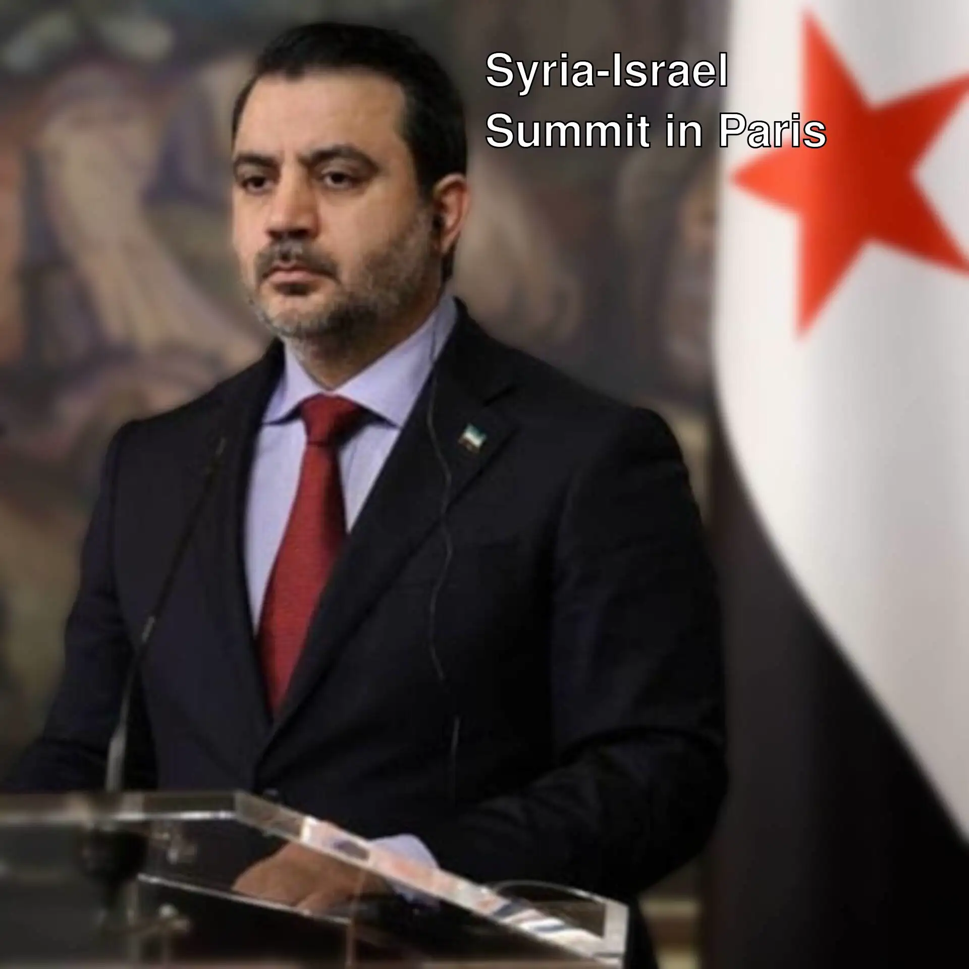 A man standing at a podium. A man standing at a podium.