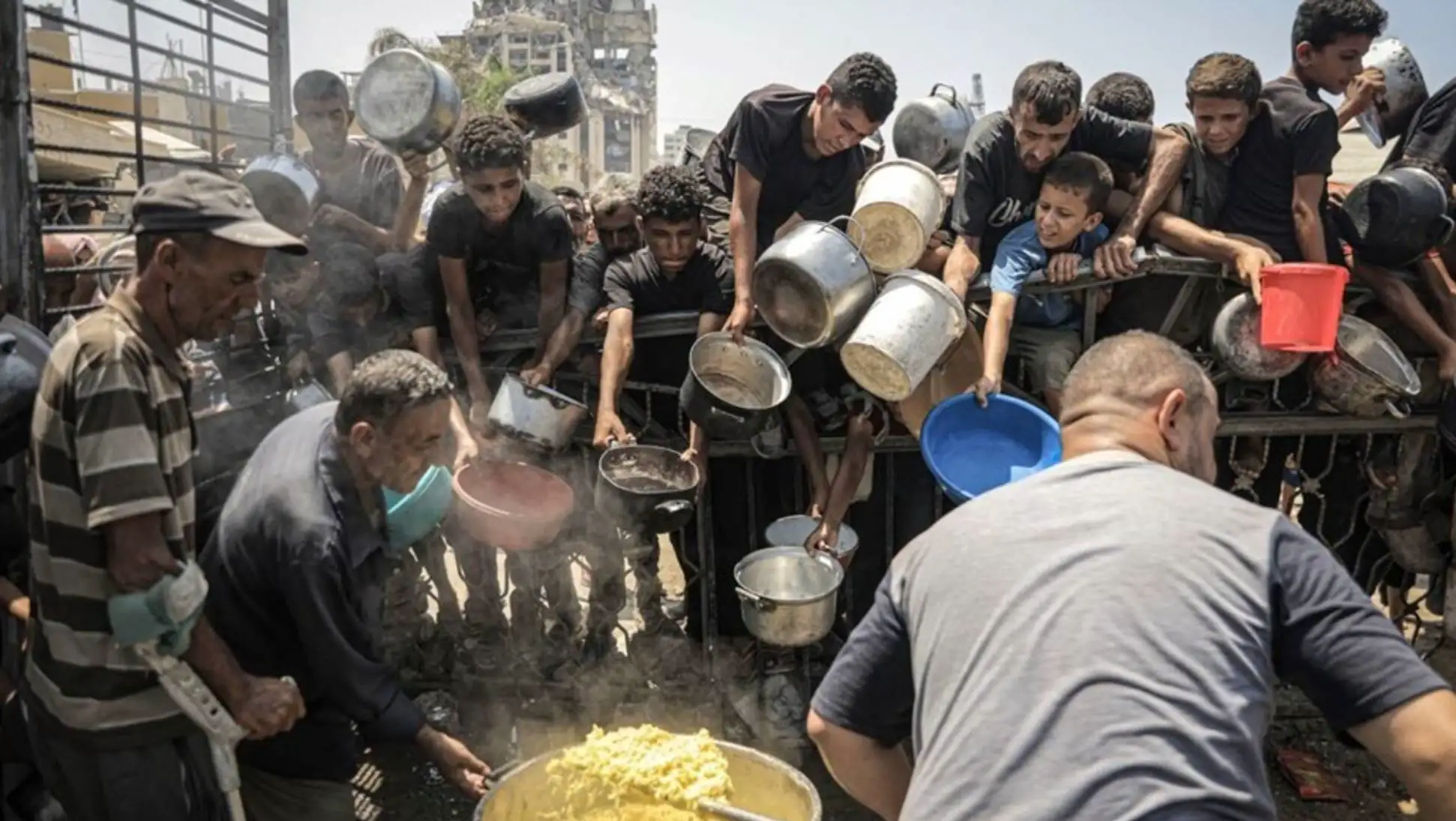 A group of people with pots and pans. A group of people with pots and pans.