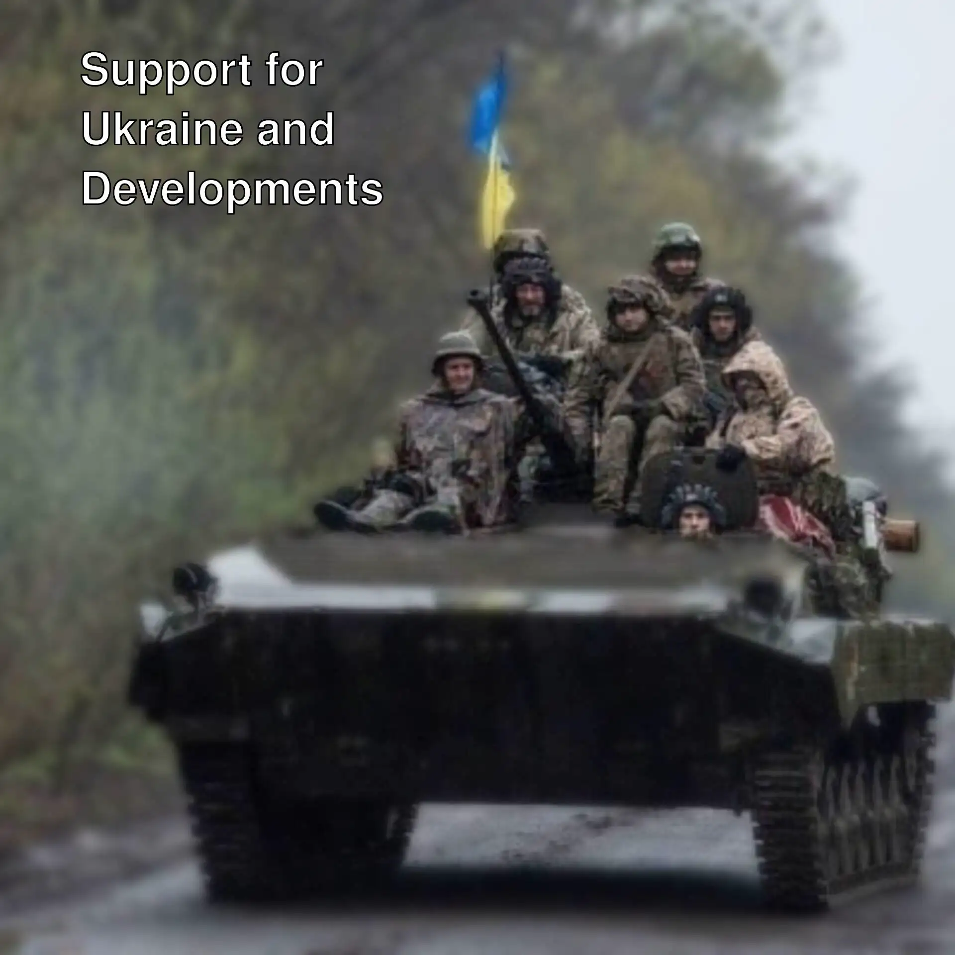 A group of people in military uniforms riding on a tank. A group of people in military uniforms riding on a tank.
