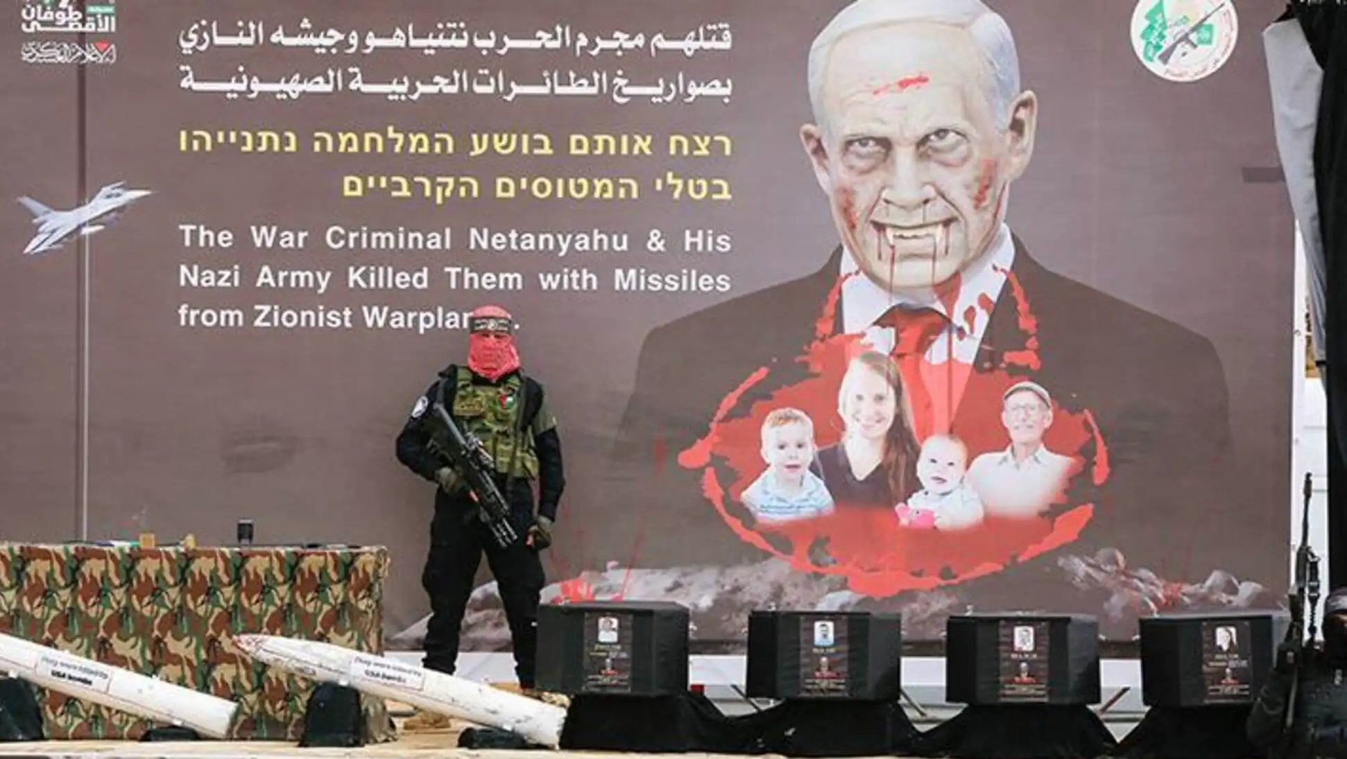 A man standing in front of a poster.