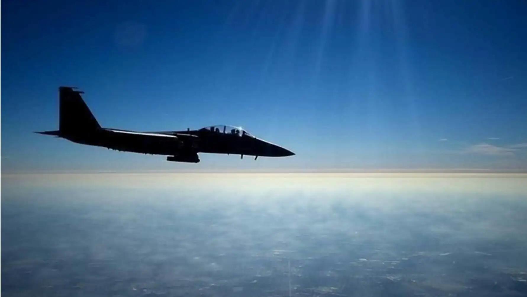 A jet flying in the sky.