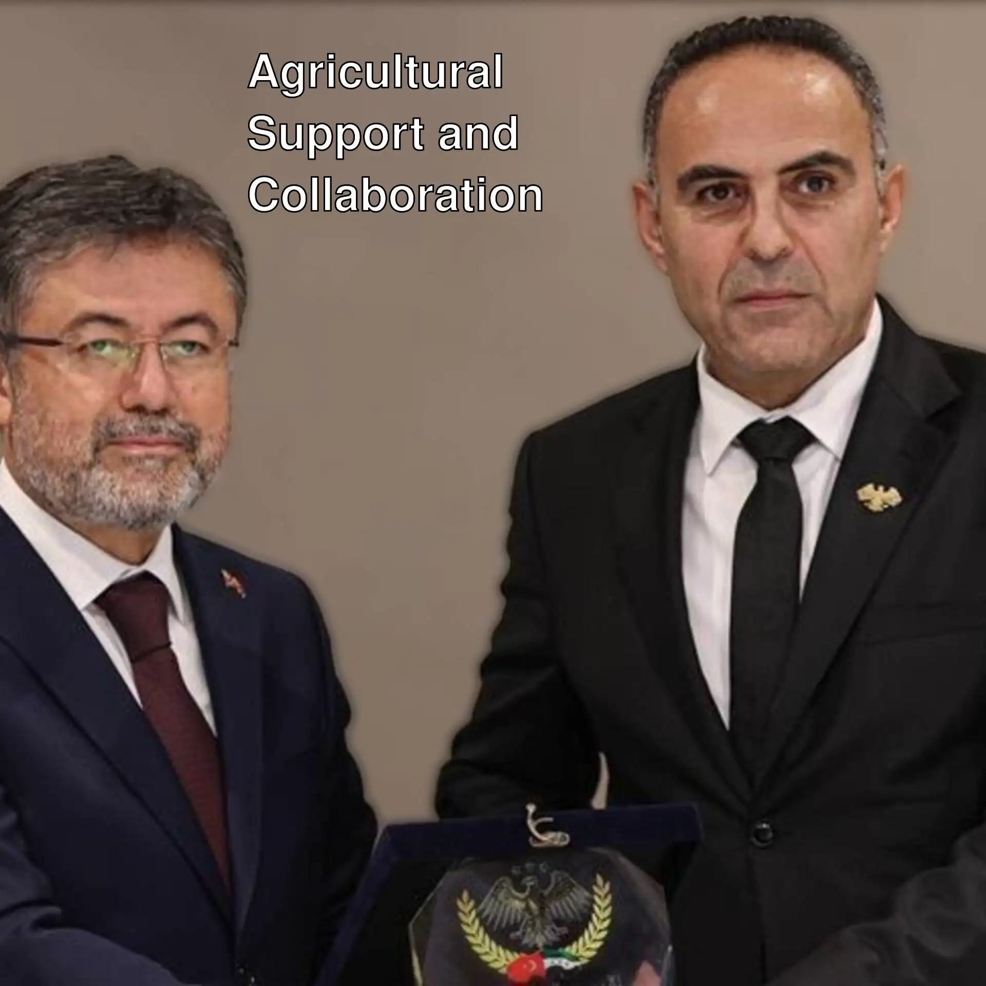 Two men in suits and ties.