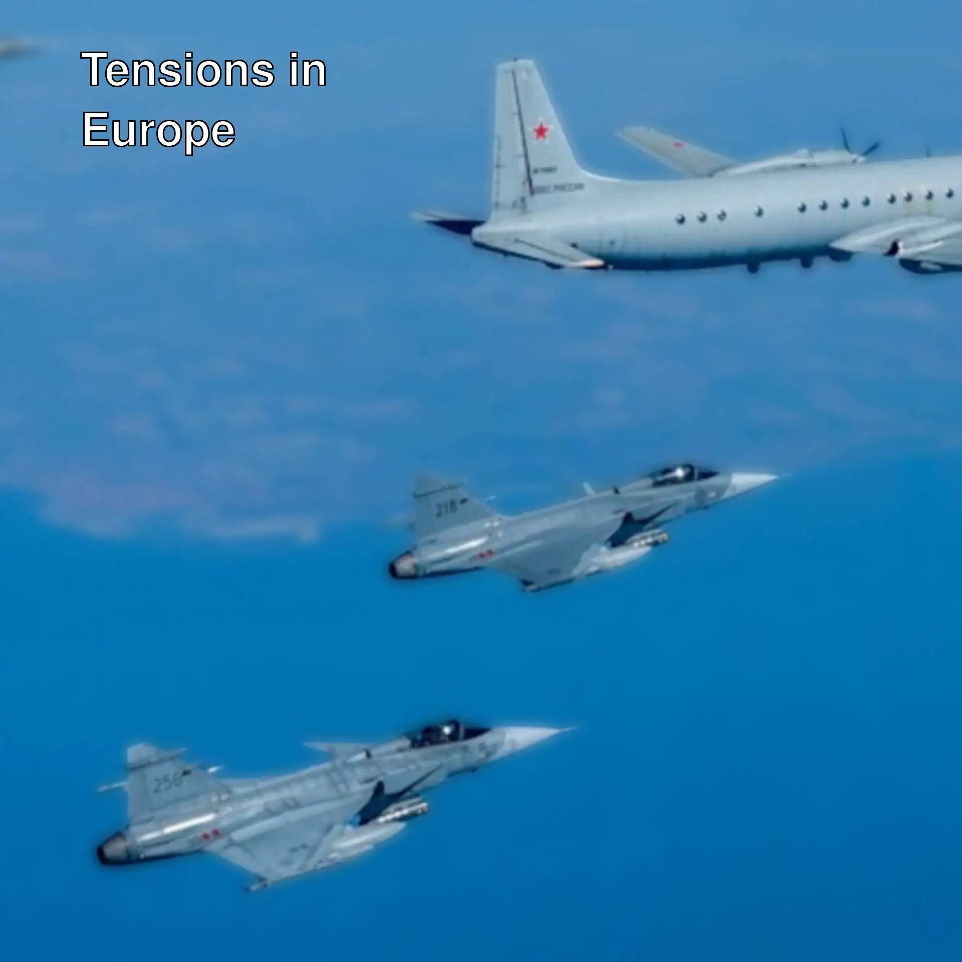 A group of airplanes flying in the air