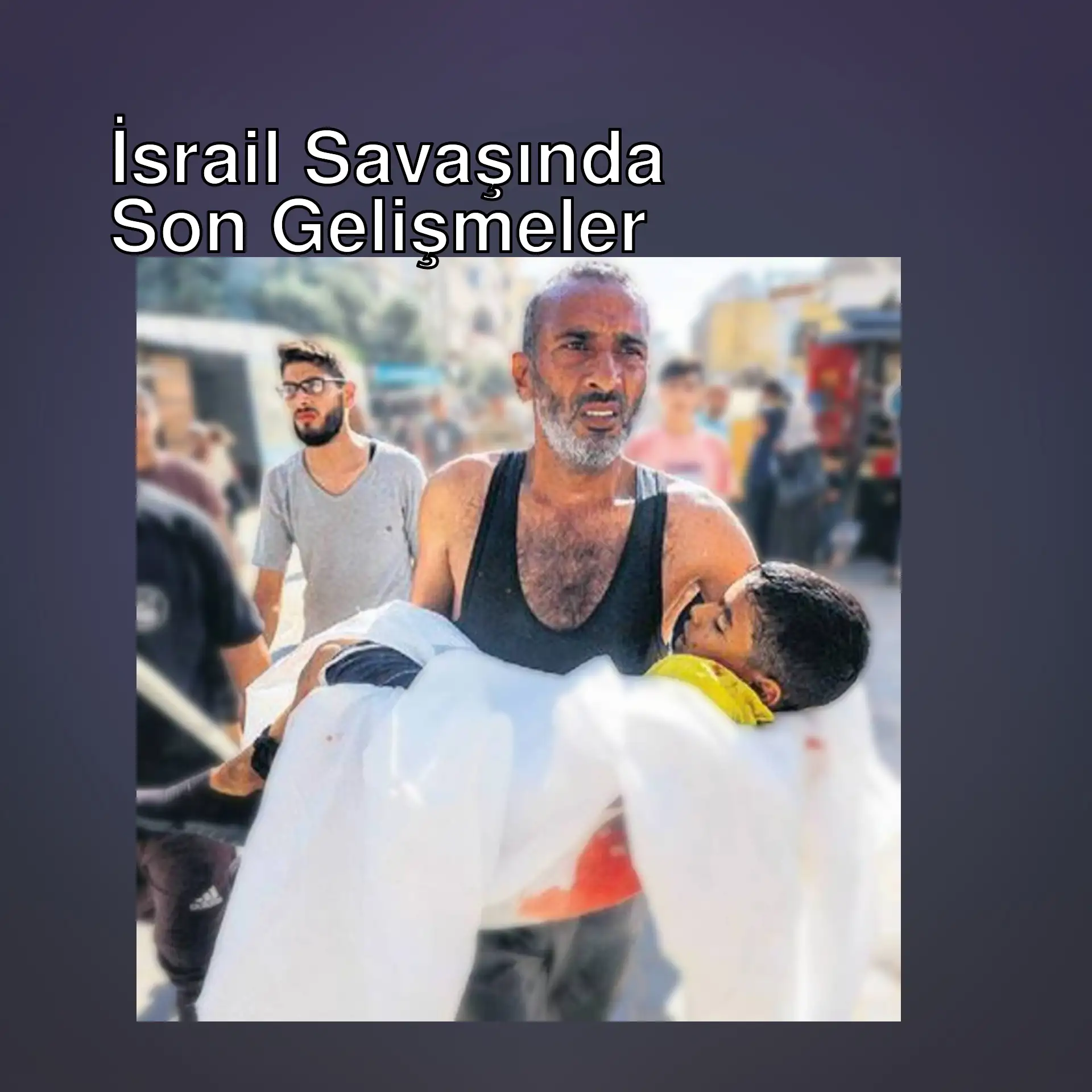 İsrail'in Gazze'deki saldırıları sırasında bir adam çocuğu tutuyor.
