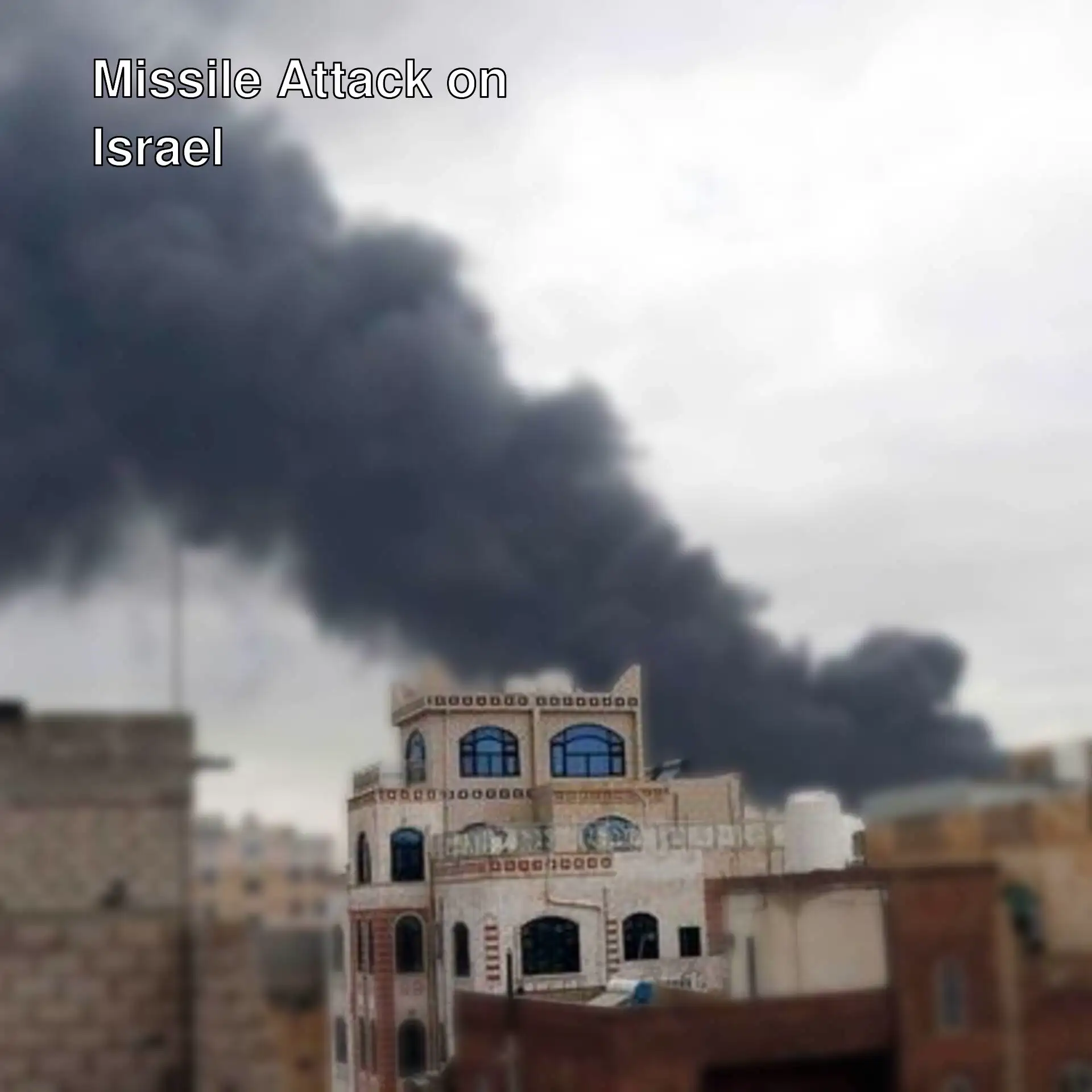 Smoke billowing from a building after the missile attack.