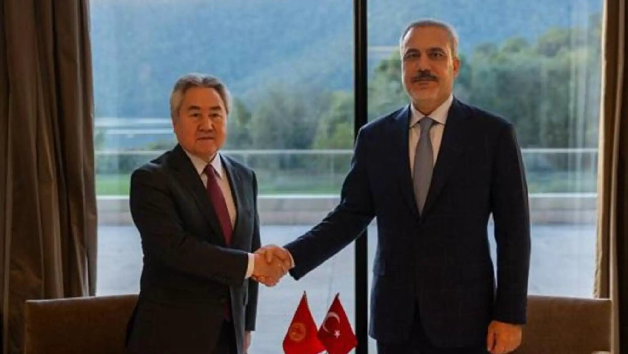 The moment two ministers shake hands.