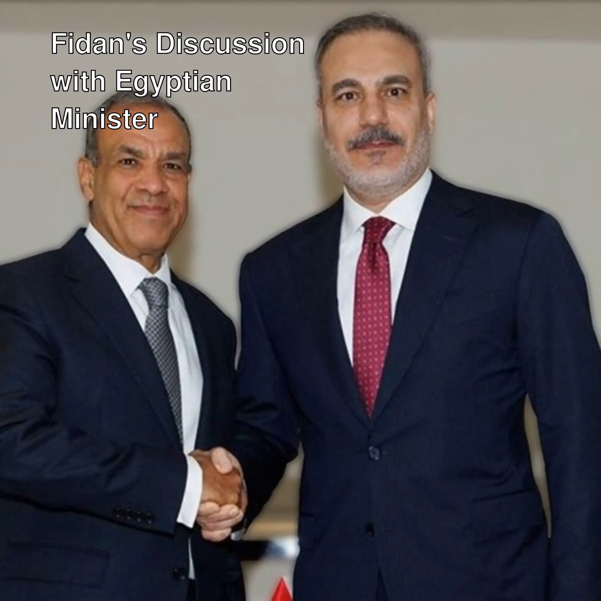 Foreign Minister Hakan Fidan and Egyptian counterpart Abdulati shake hands.