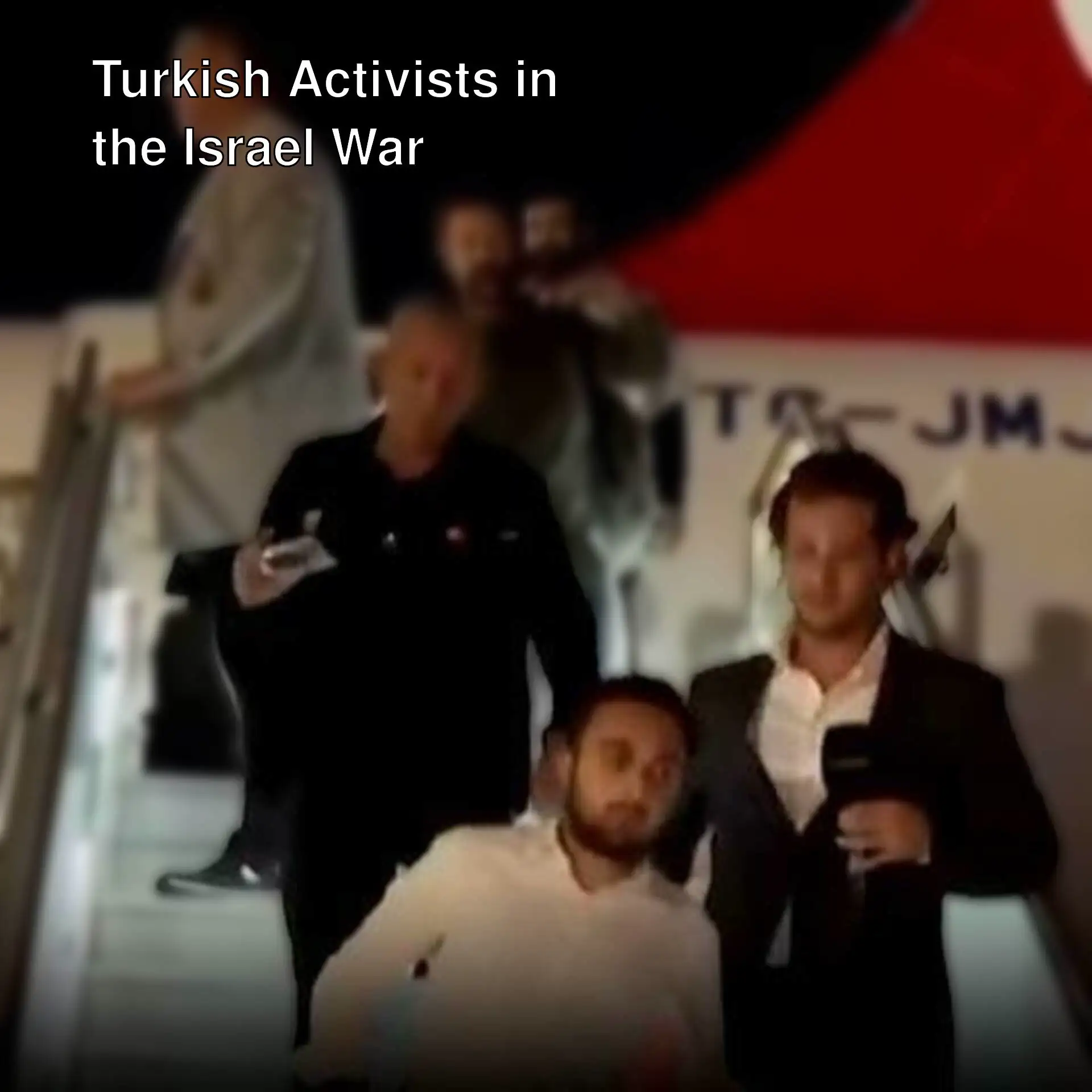 A group of activists boarding a plane.
