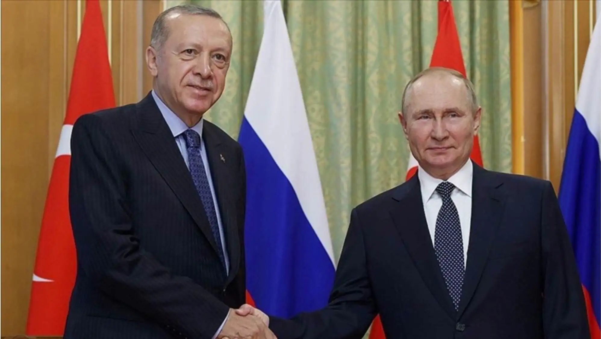 President Erdoğan and Putin shaking hands during the meeting. President Erdoğan and Putin shaking hands during the meeting.